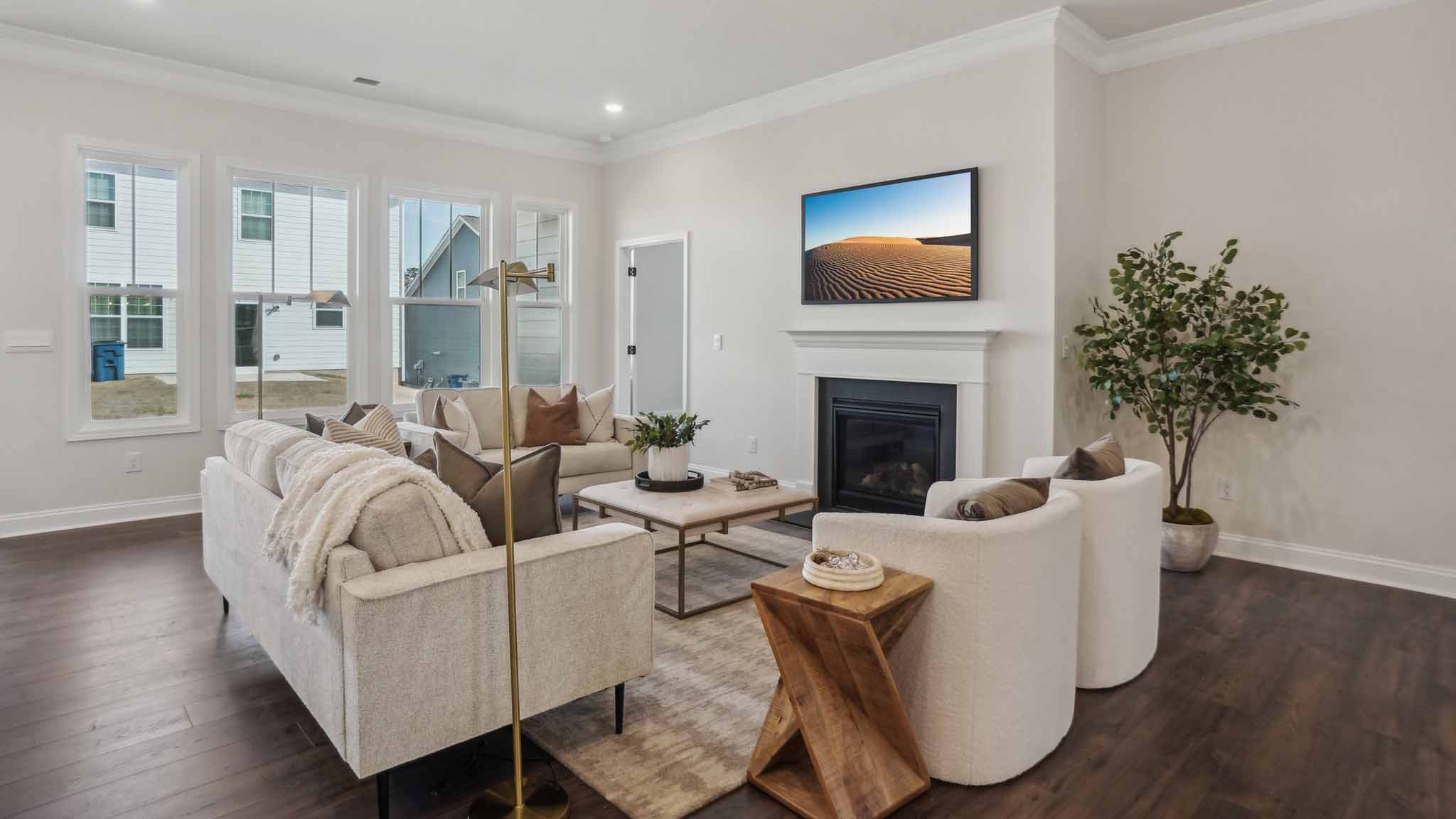 Dining area with wood floors and view of foyer