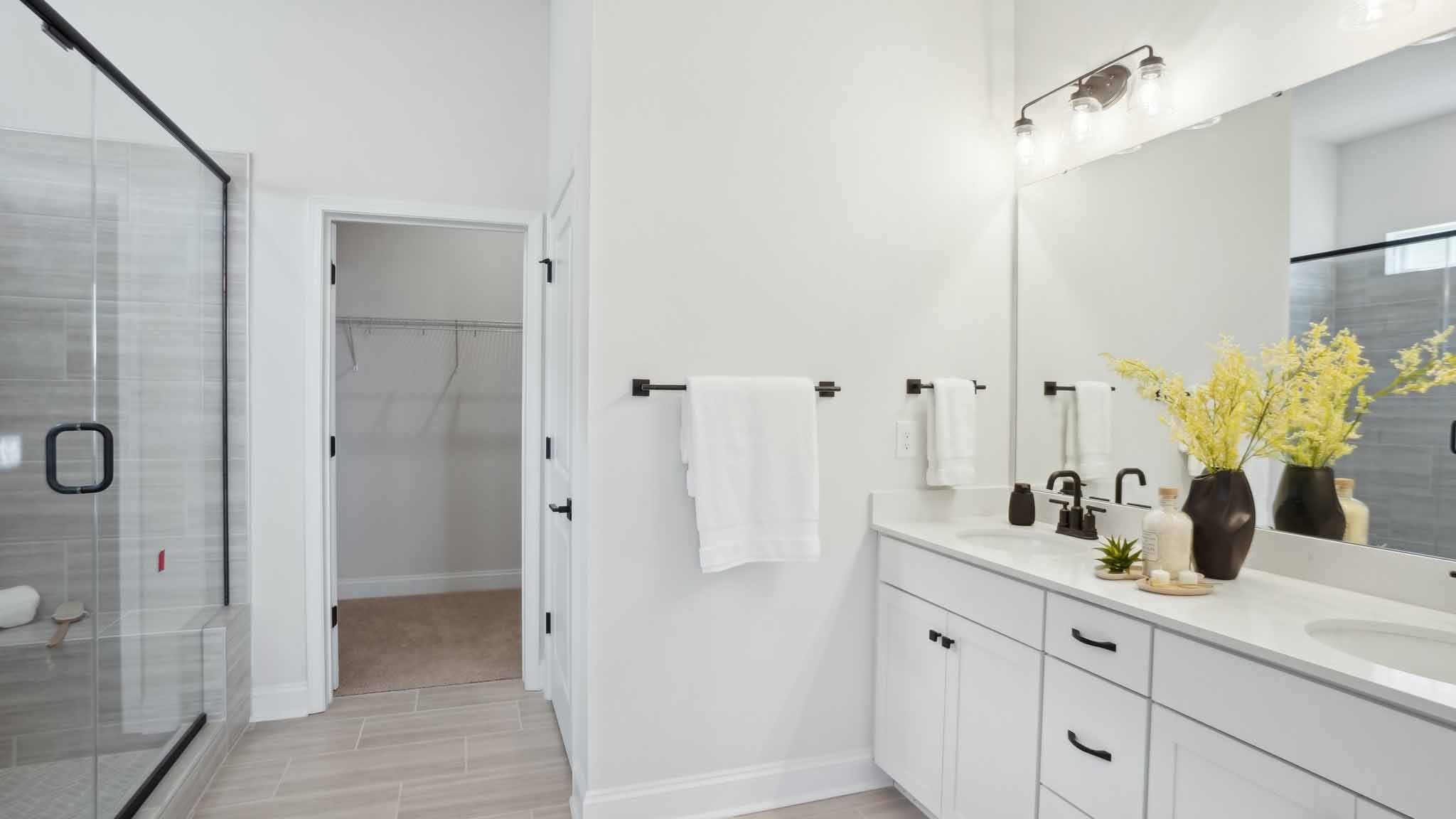 Primary bathroom with large glass shower