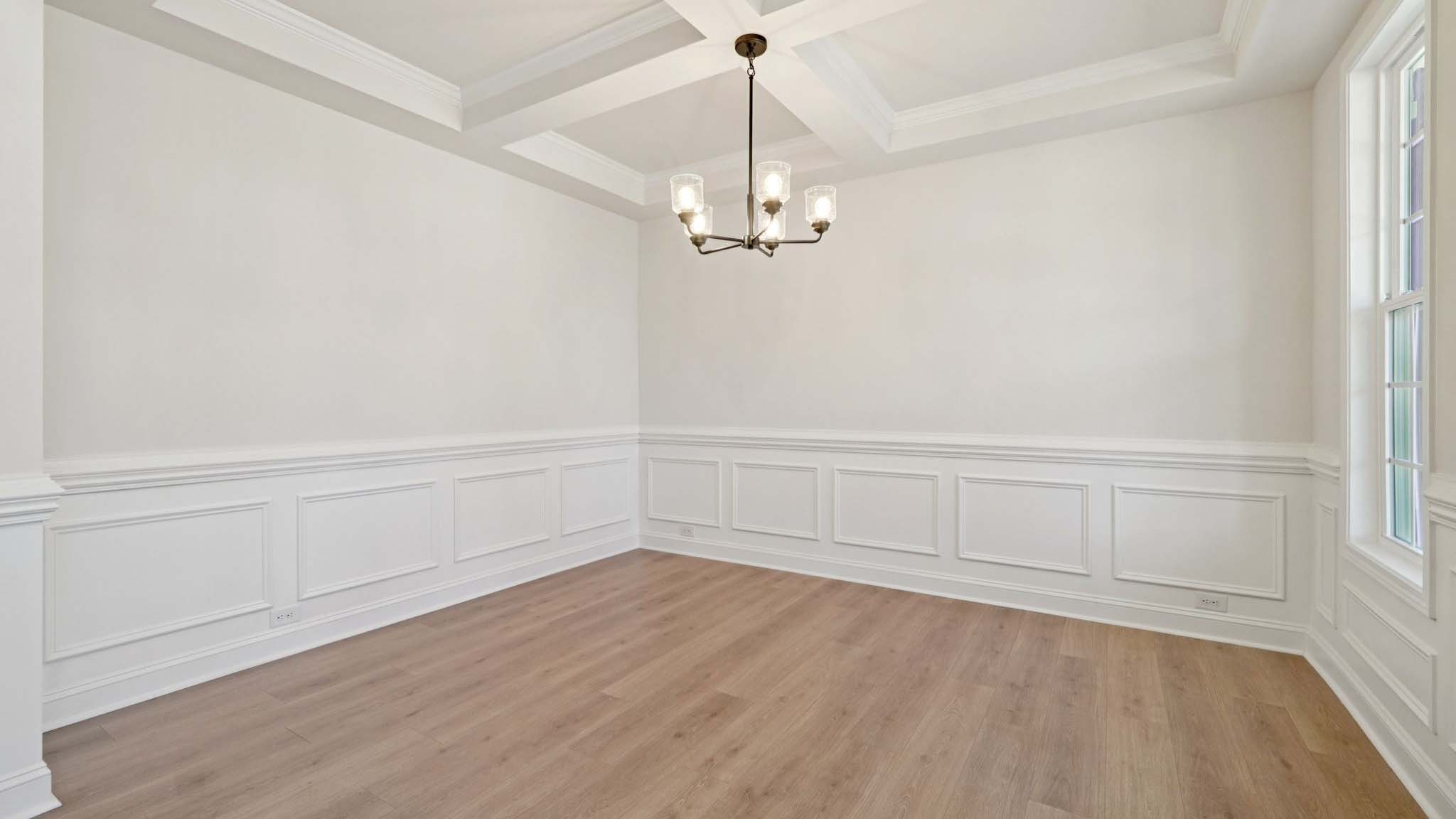 Dining room with hanging light fixture