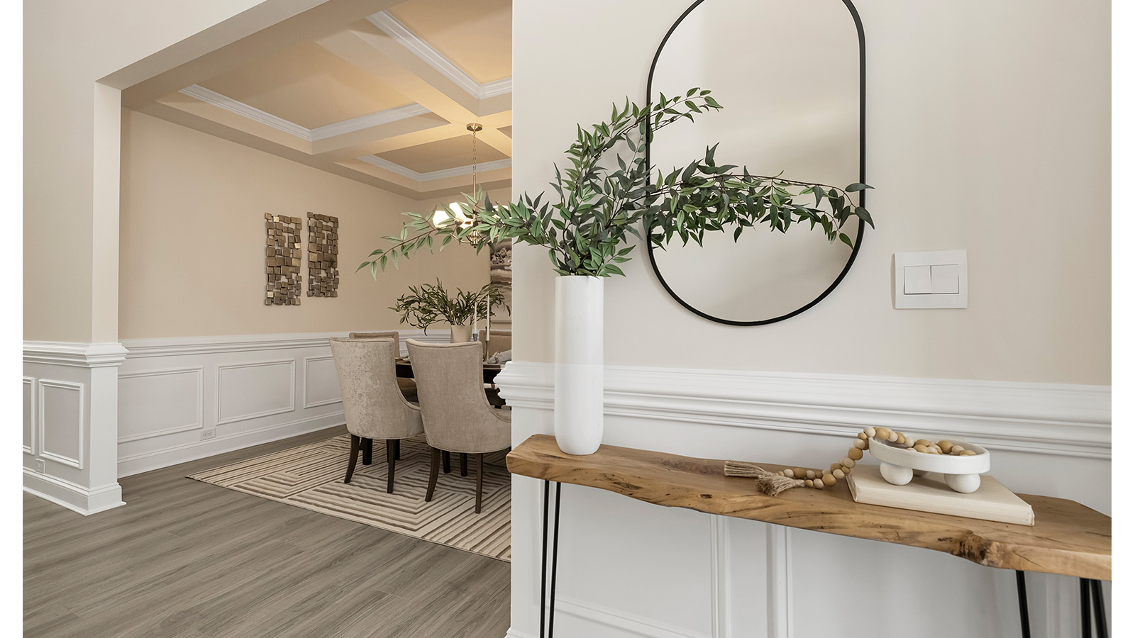 Welcoming foyer view of dining room