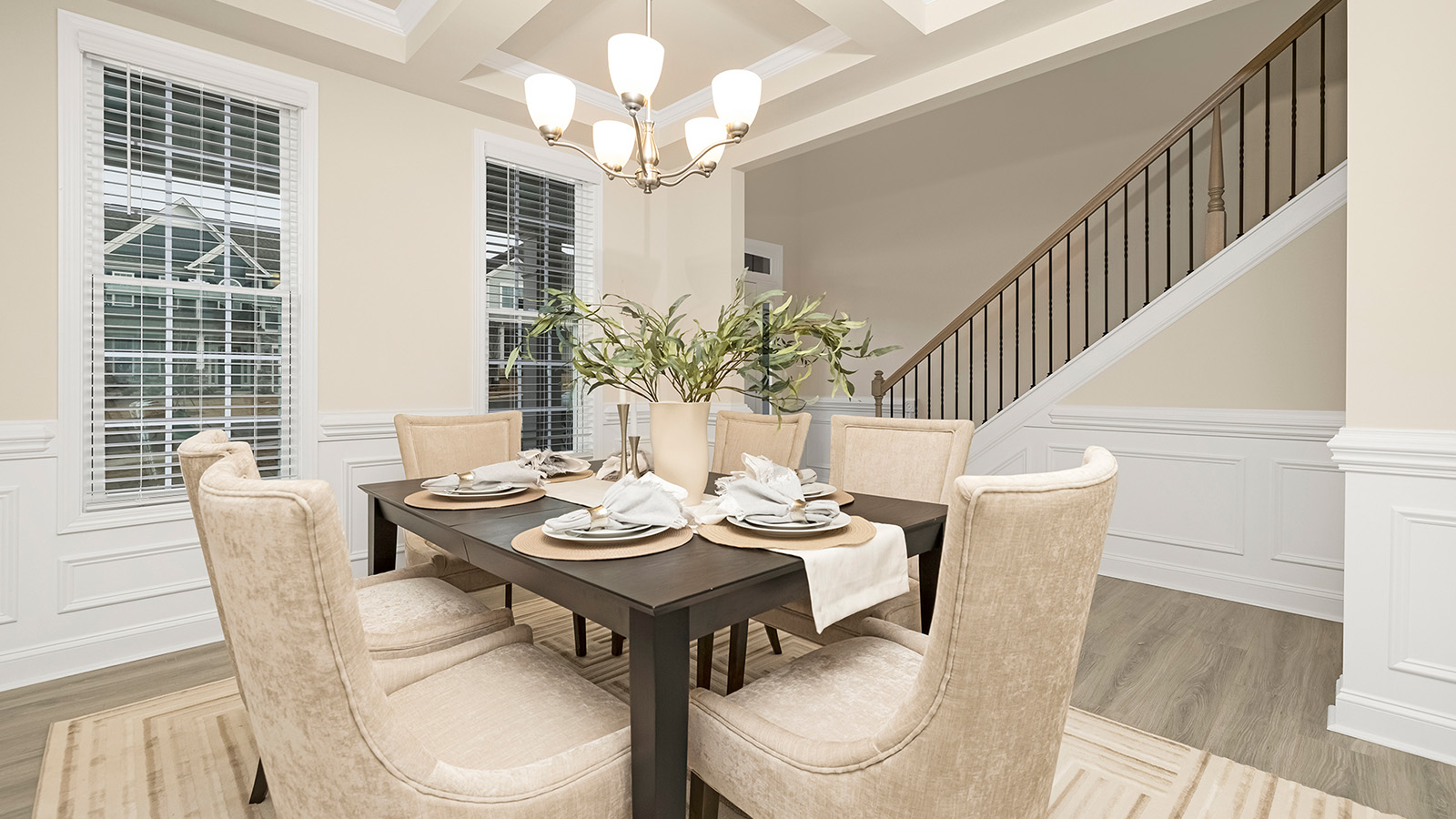 Dining room off of foyer with two large windows