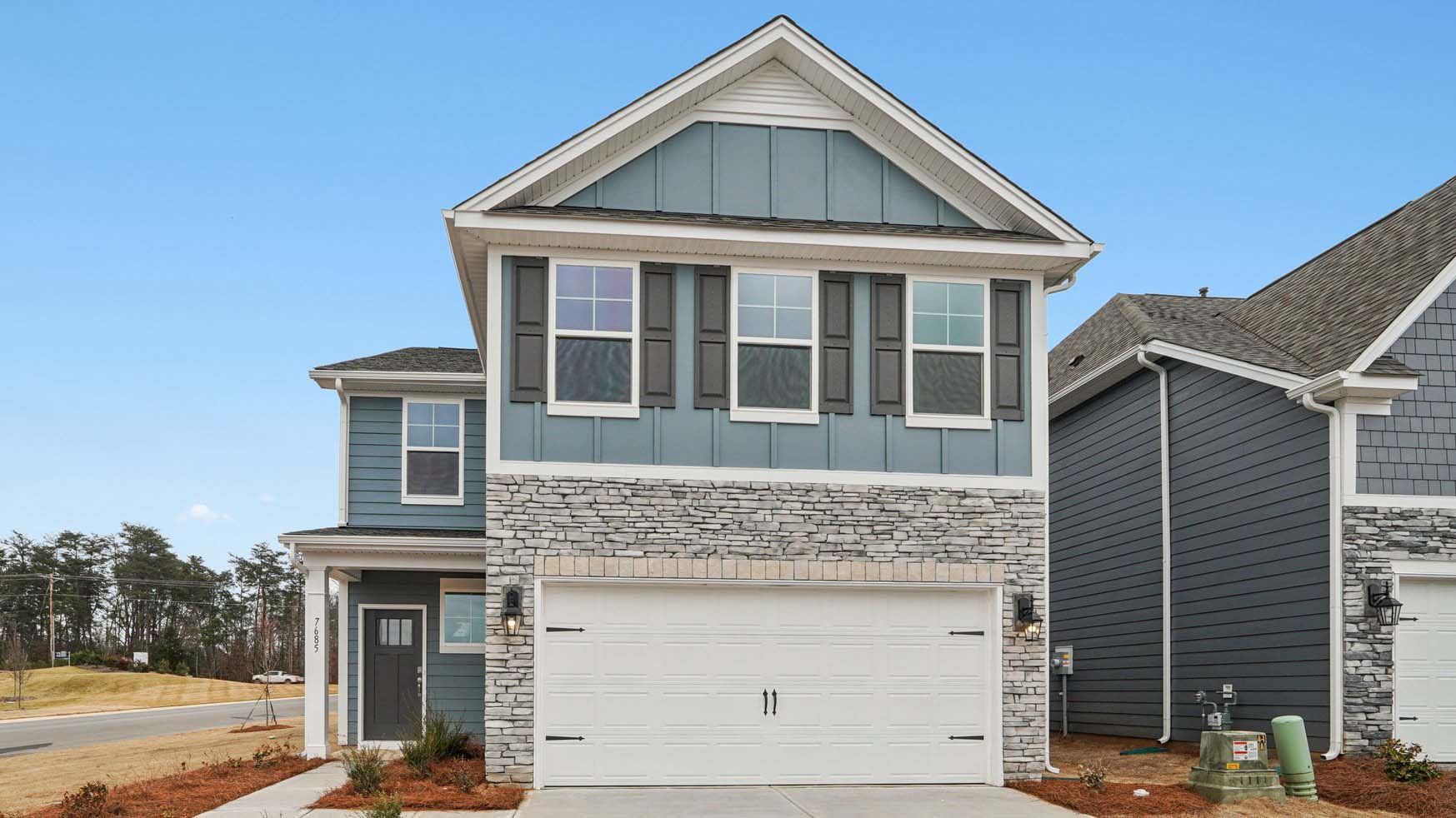 Landon front exterior with siding and garage