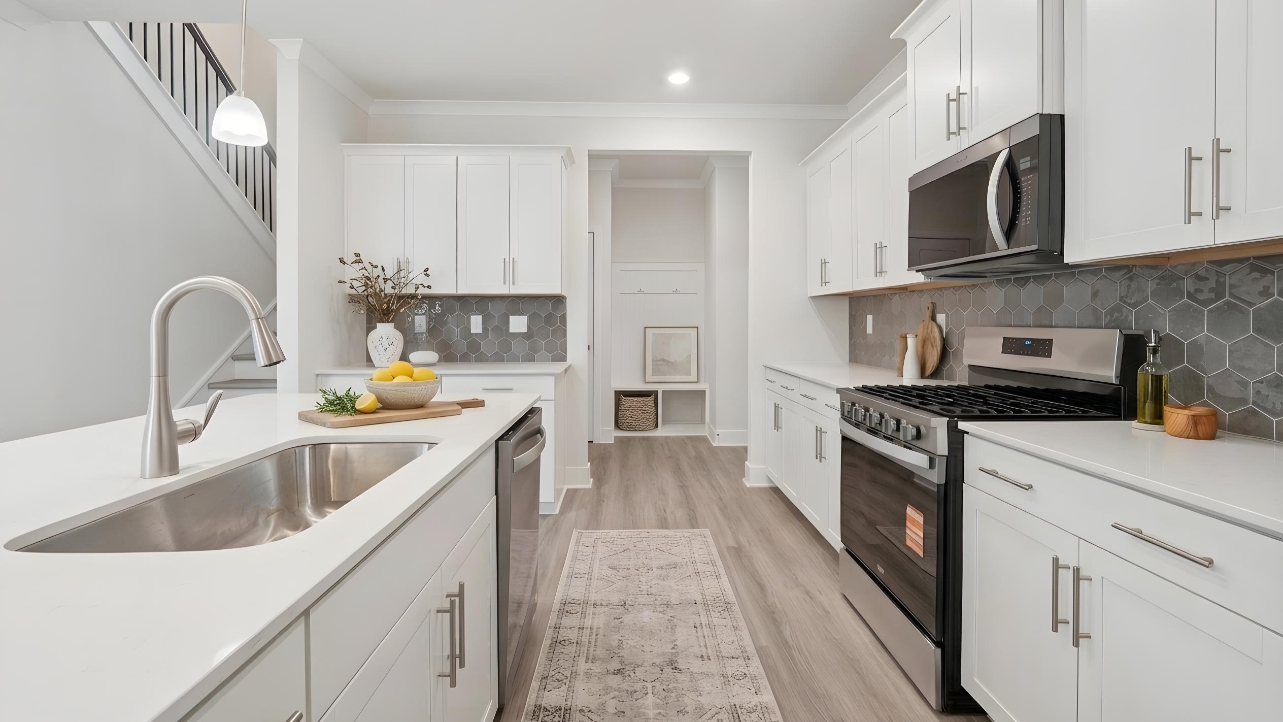 Open kitchen with stainless steel appliances