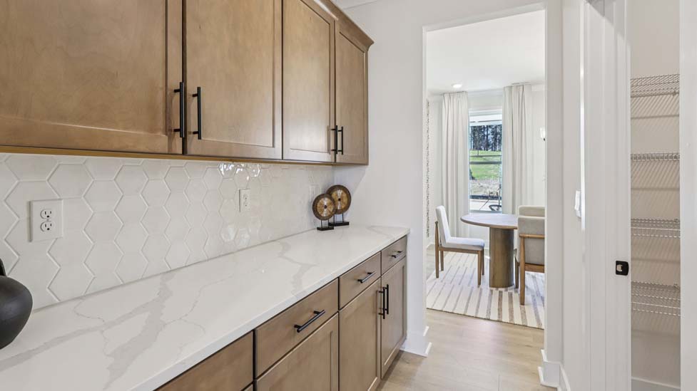Kitchen and island with stainless steel appliances