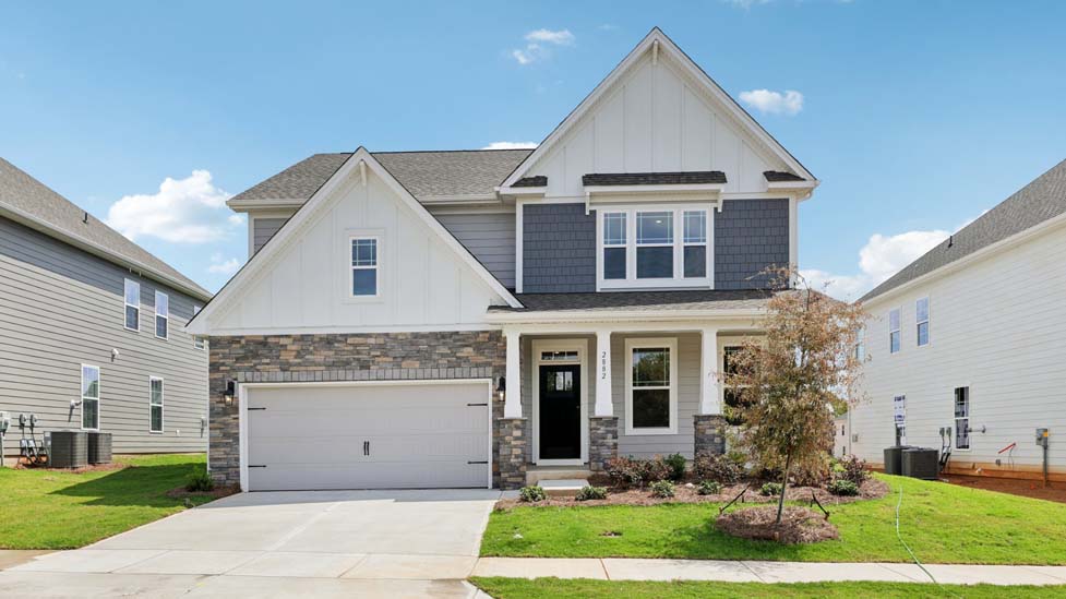 Hampshire front exterior with siding and two car garage