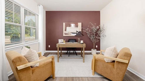 Office/flex space with large window and french doors