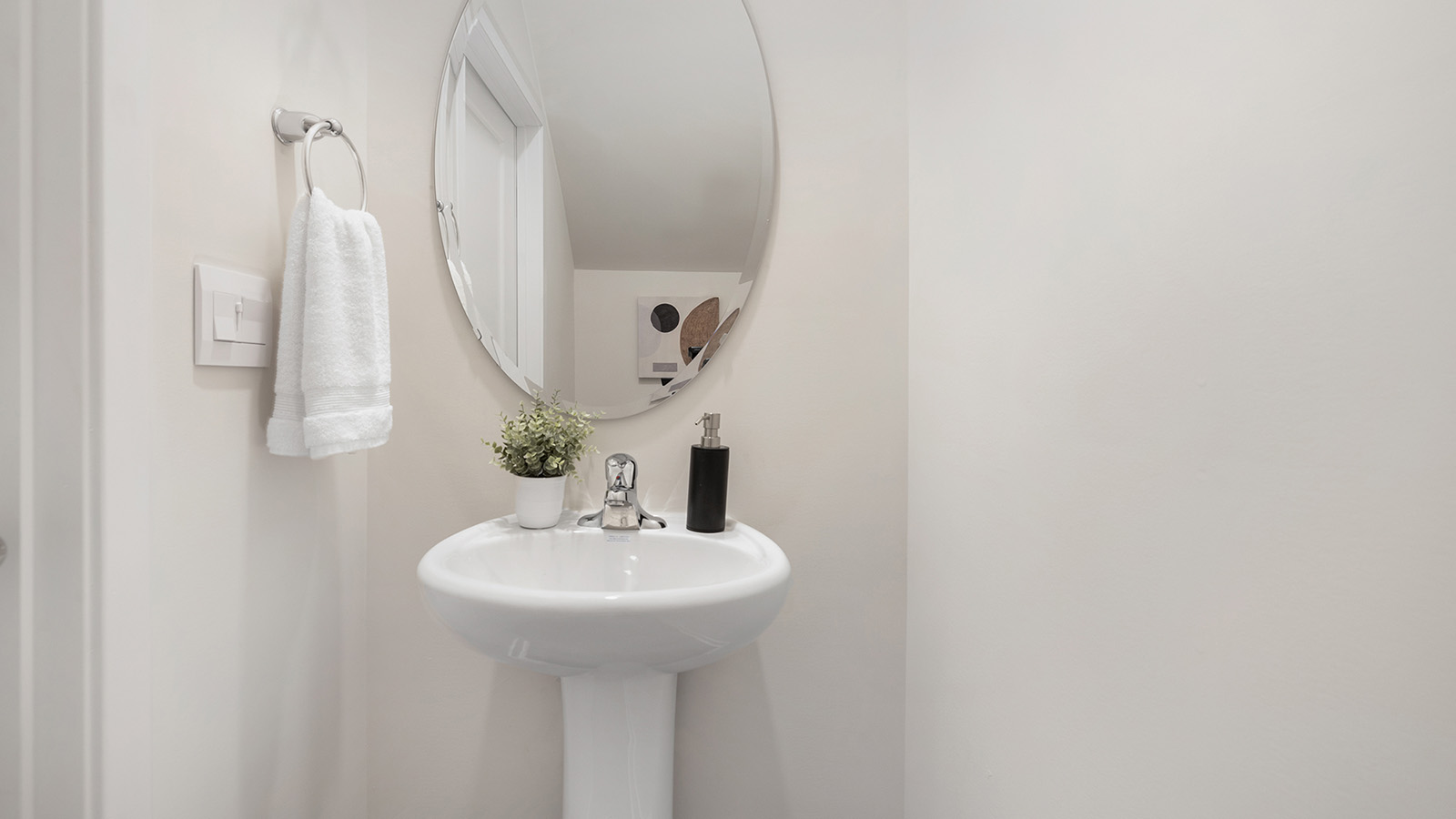 Powder bathroom with toilet and sink