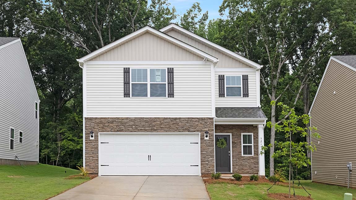 Darwin front exterior with siding and two car garage
