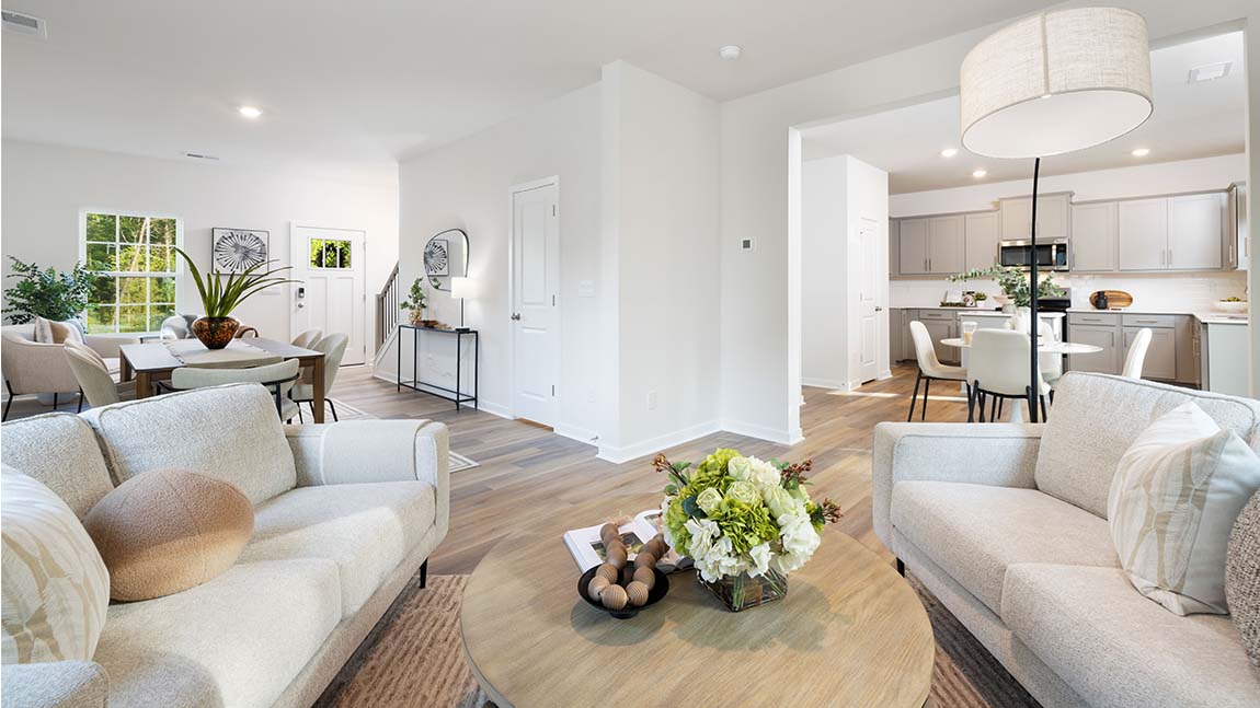 Family room with large windows and fireplace