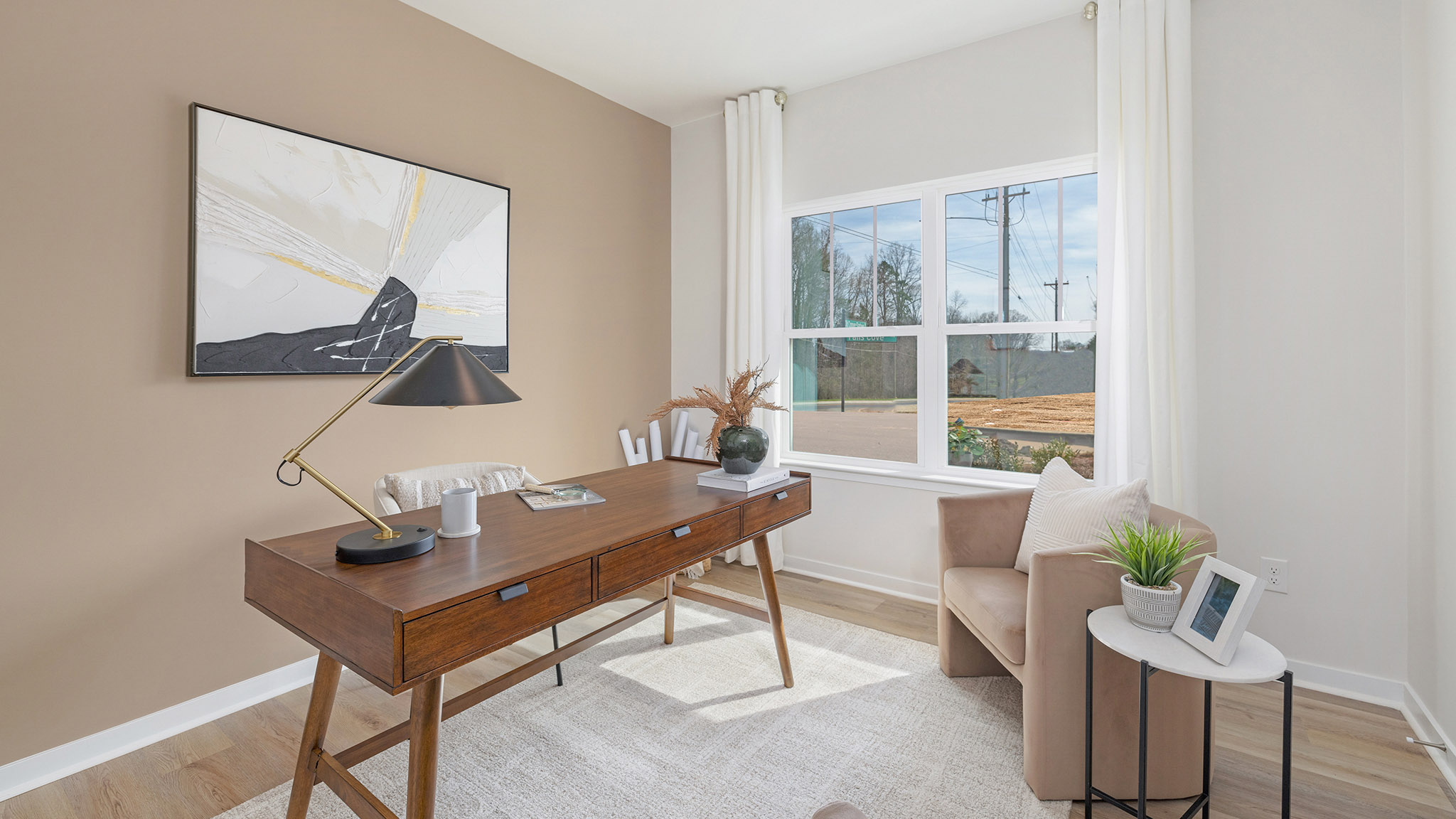 carpeted bedroom with large window