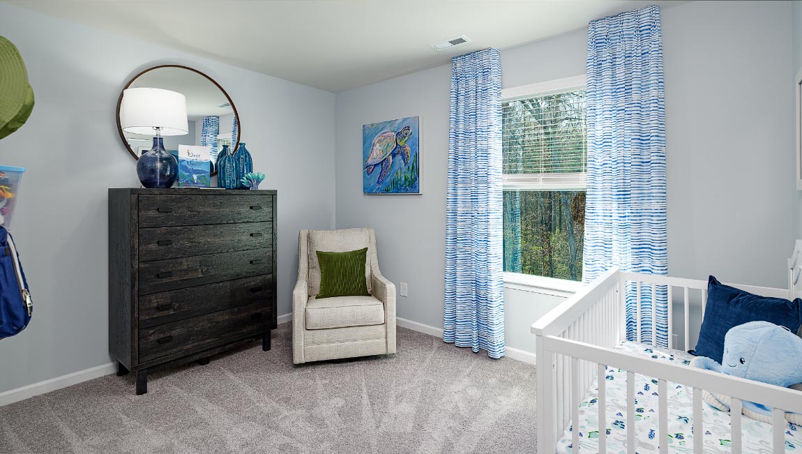 carpeted bedroom with large window