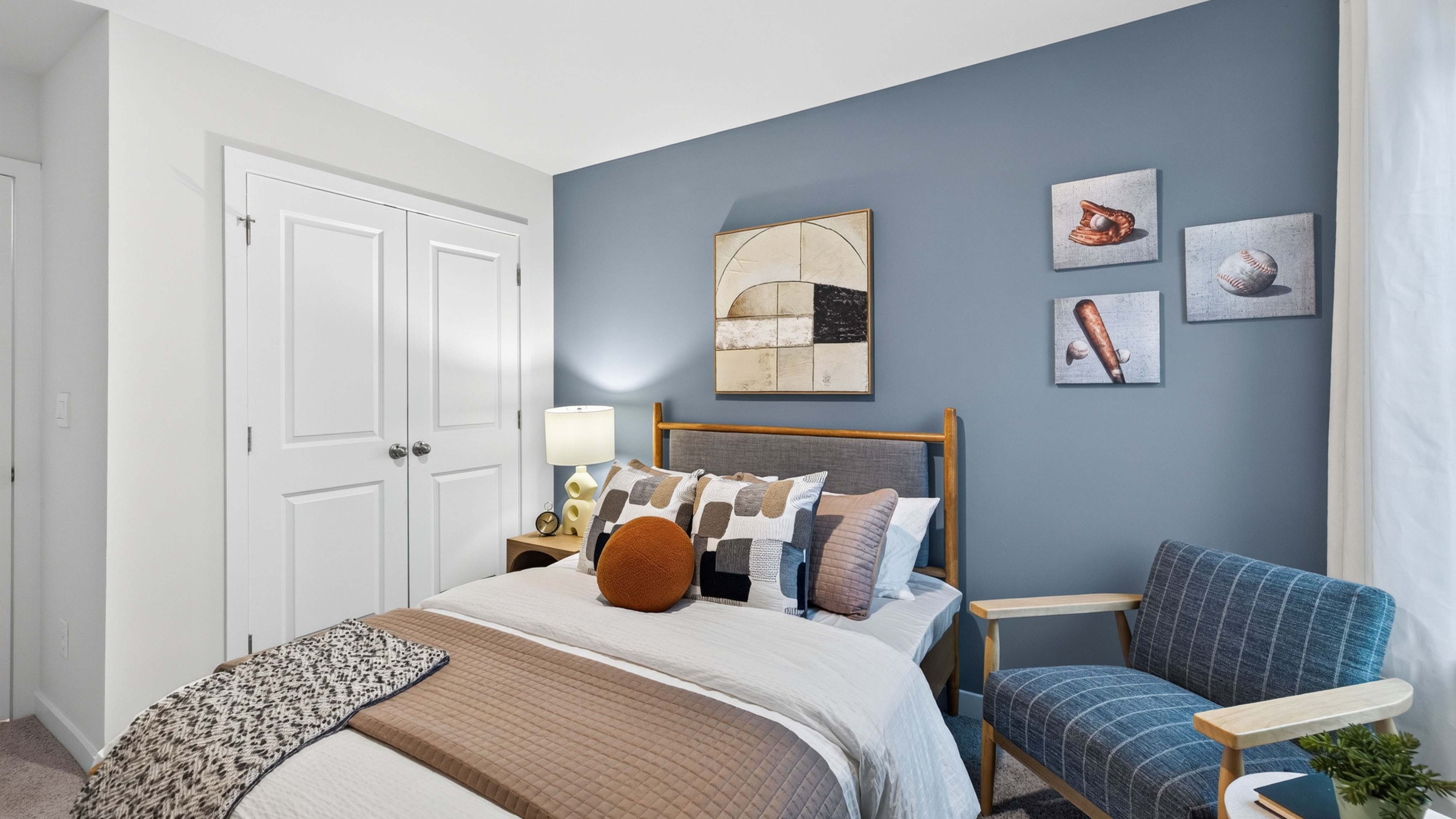 carpeted bedroom with small window