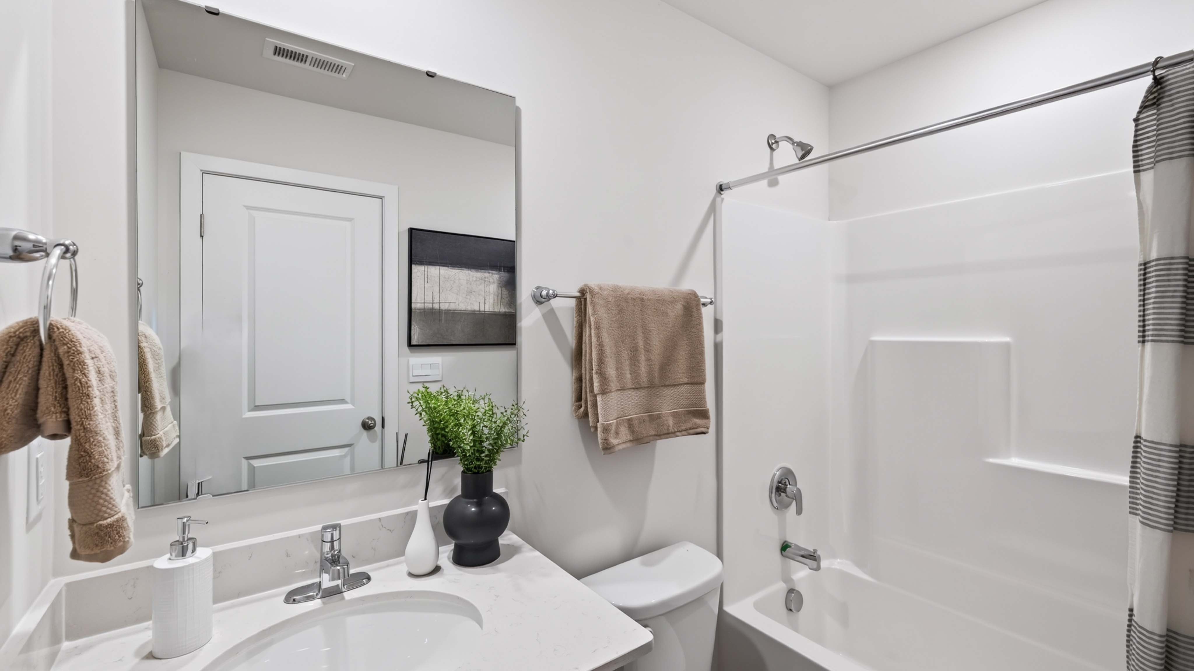 bathroom with tub shower combination