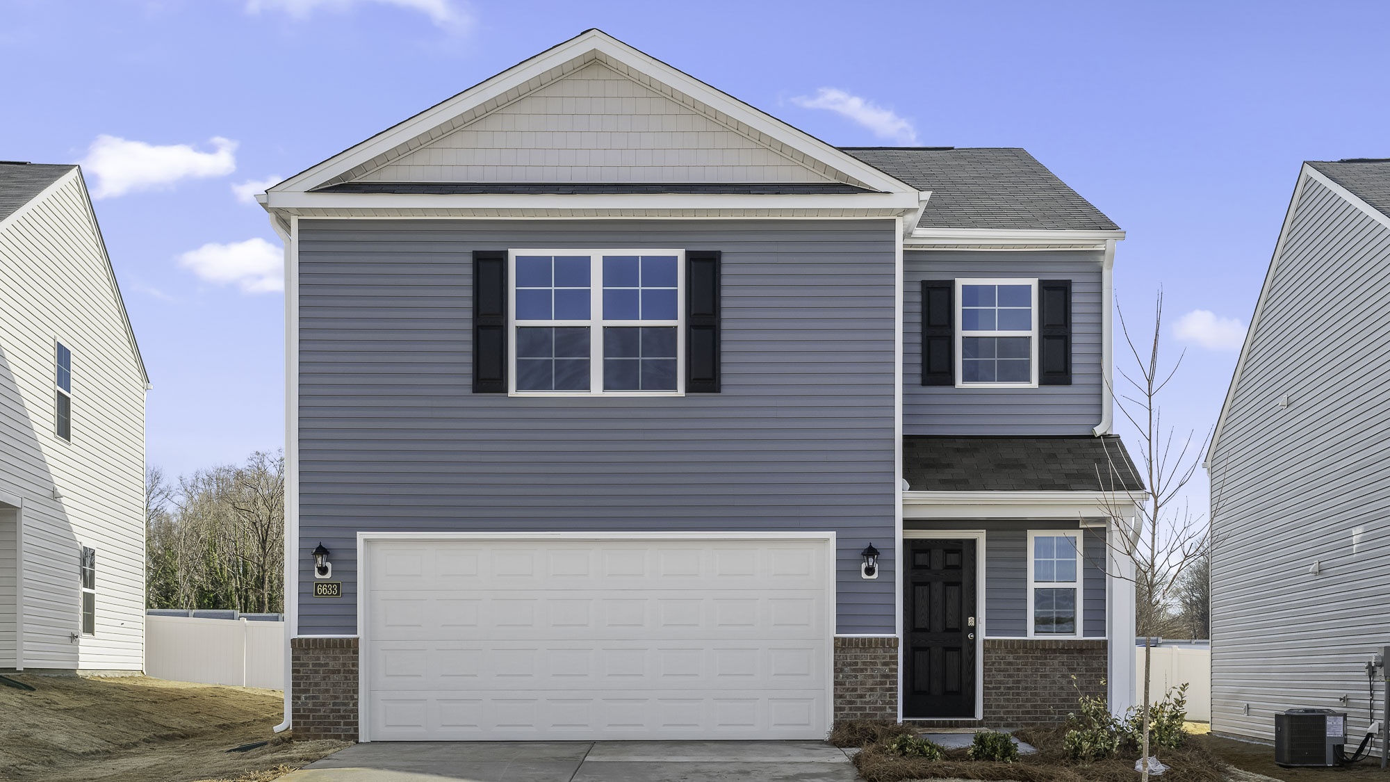2 story home with  vinyl siding