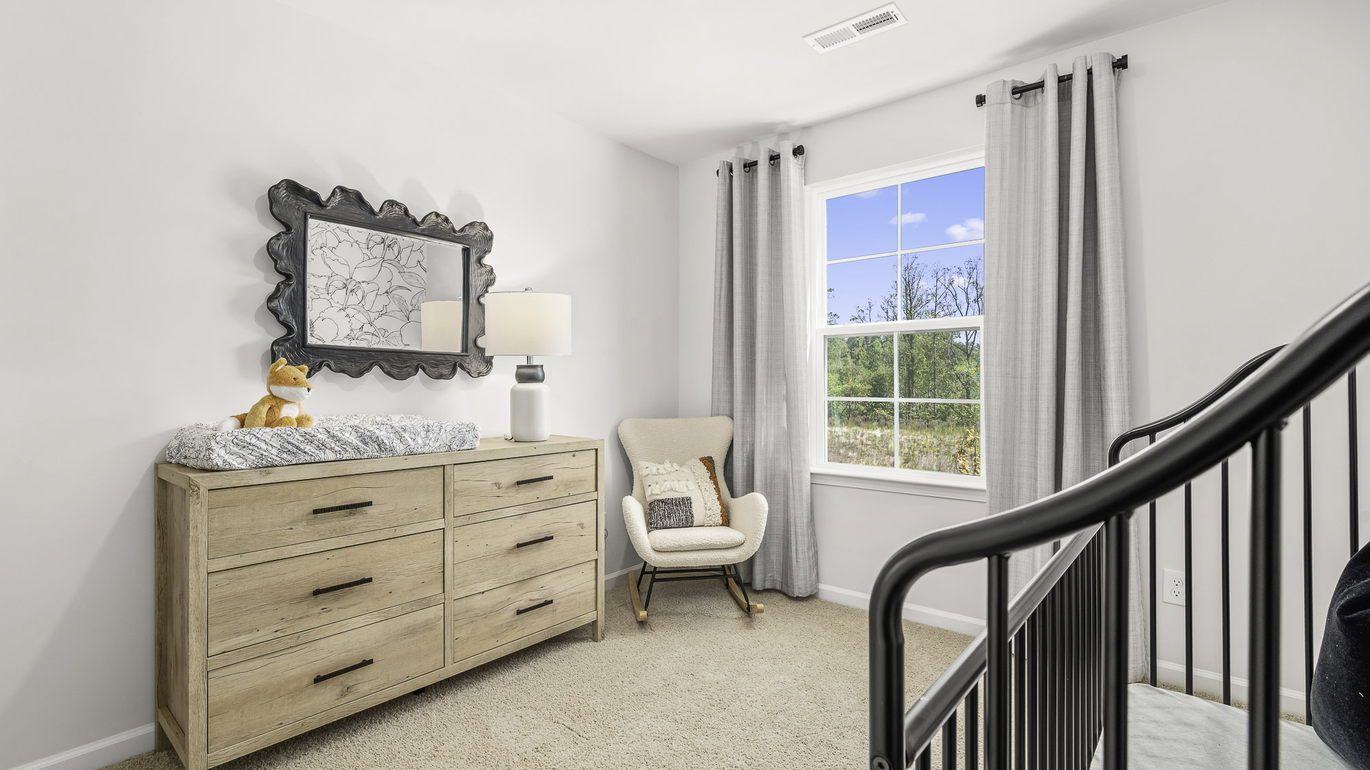 bedroom set up as a nursery