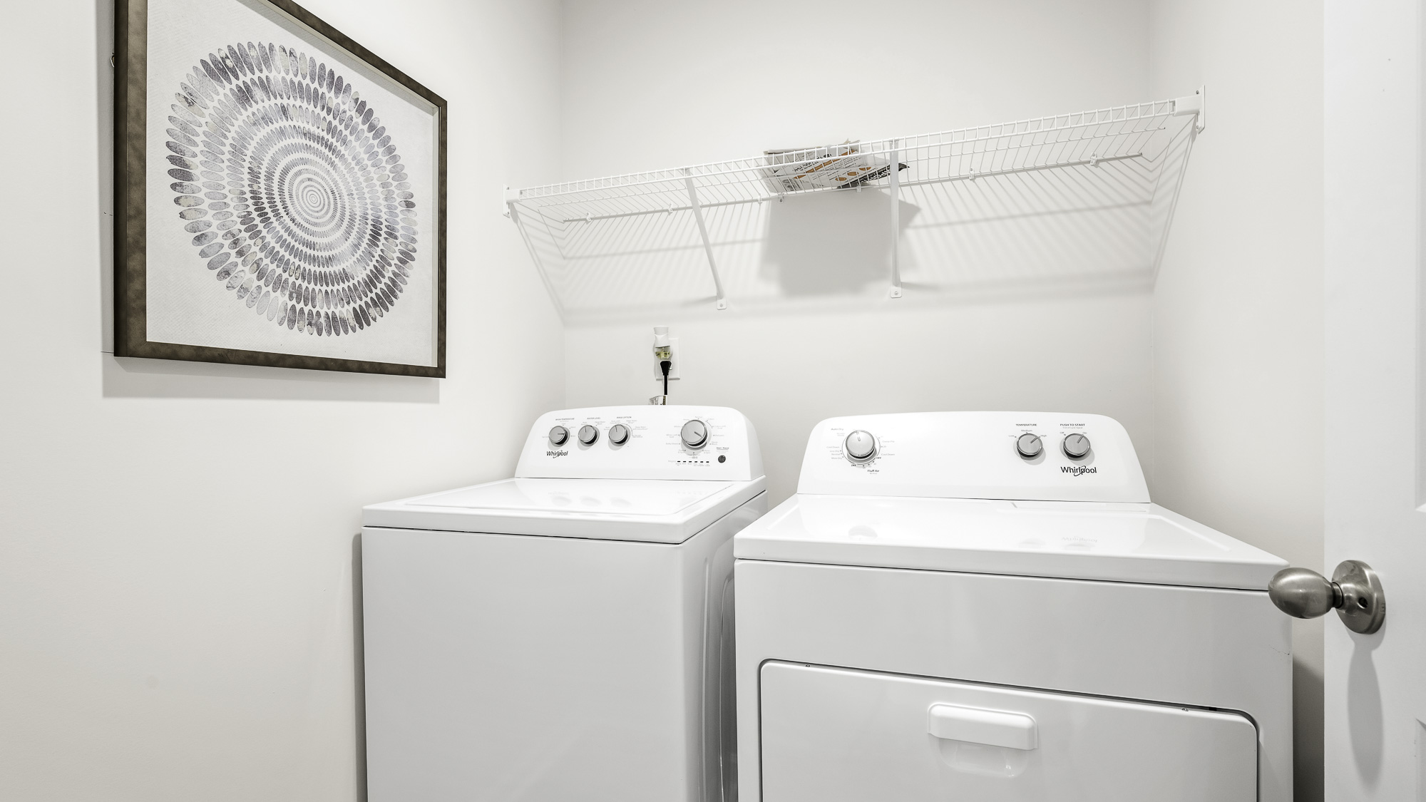 laundry room with washer and dryer