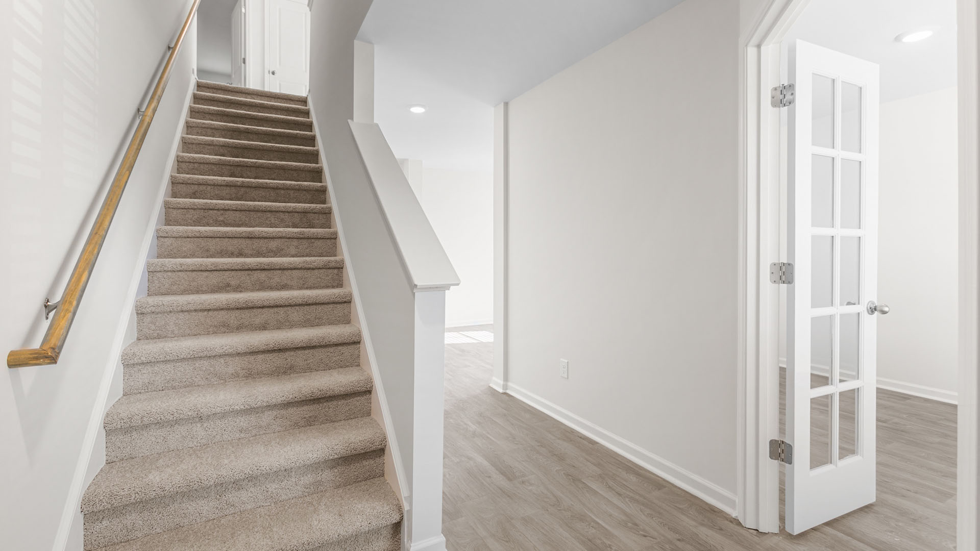 front door entrance and staircase view