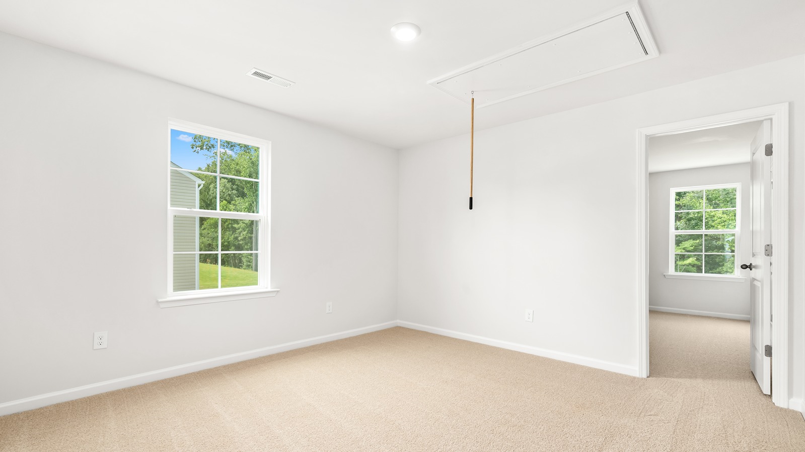 secodnary bedroom with carpet
