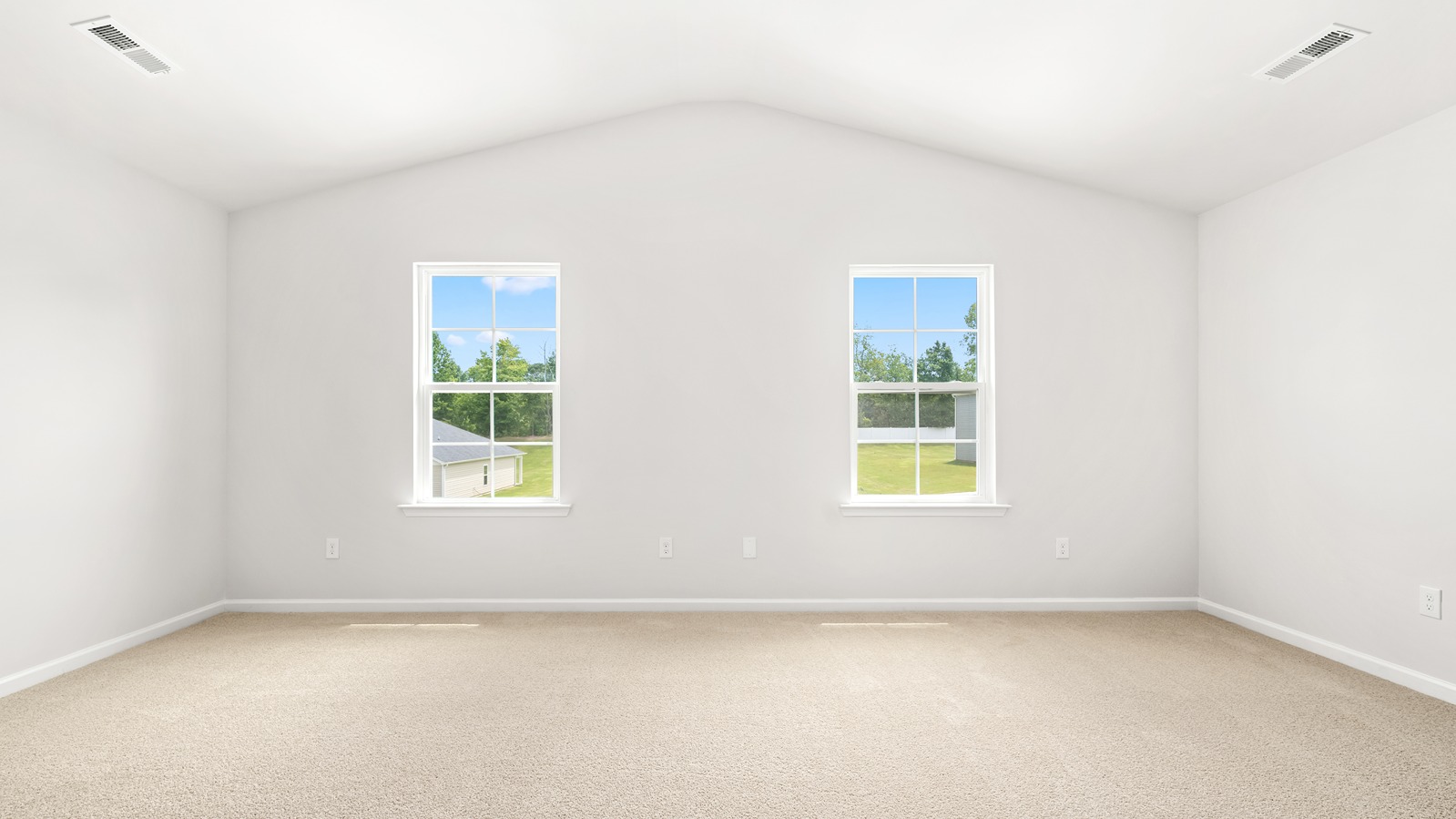 primary bedroom with windows