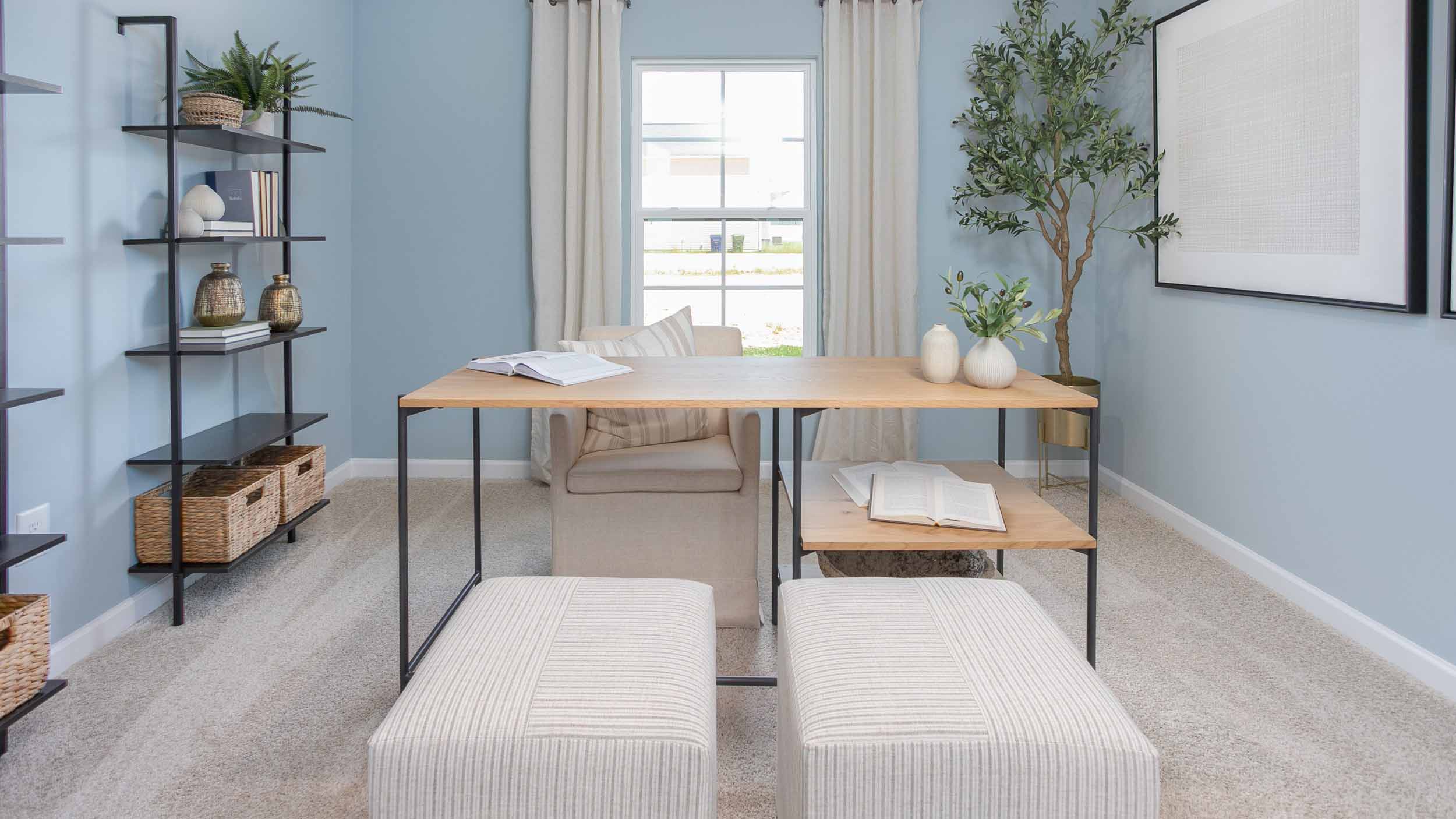 bedroom that is set up as an office