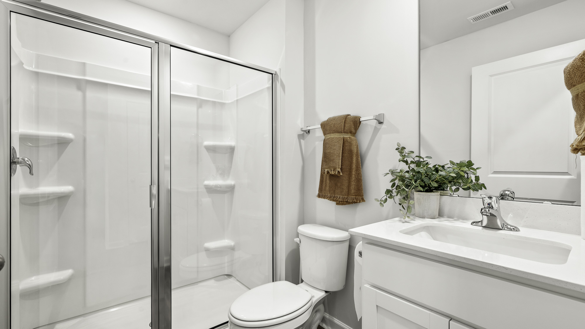secondary bathroom with walk in shower
