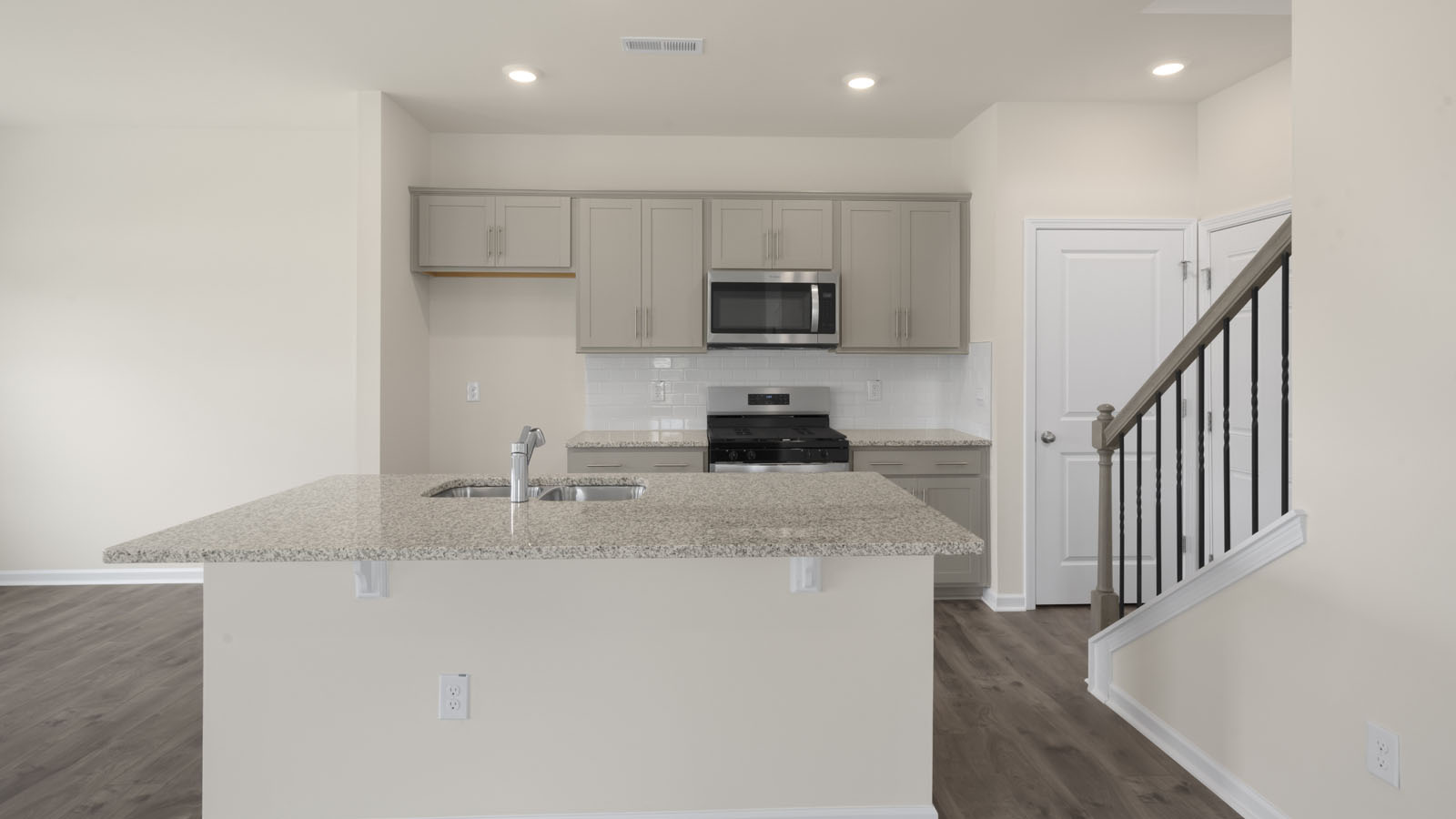 kitchen and island and stainless appliance