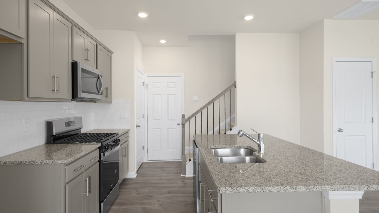 stainless steel and gray cabinets