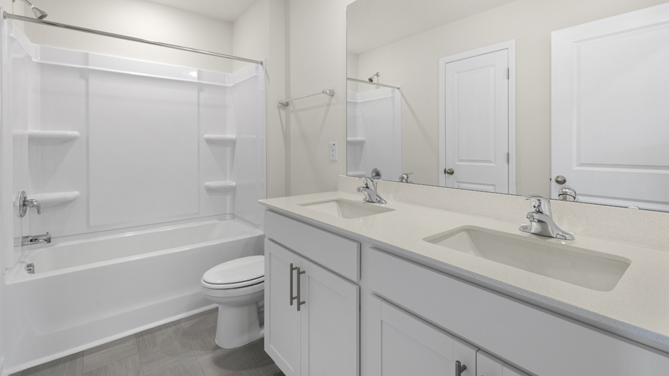 primary bathroom with sink bowl and shower view