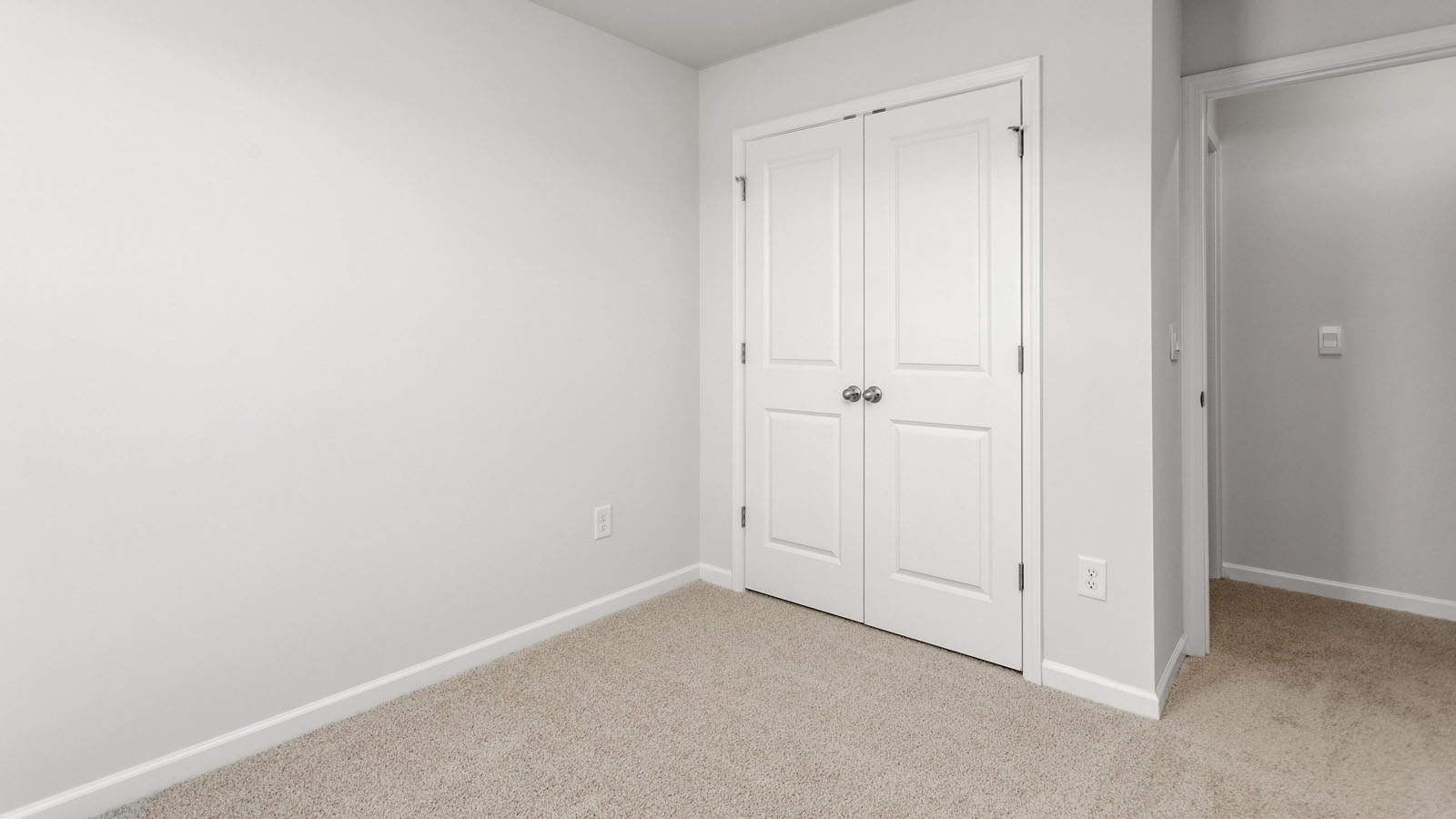 secondary bedroom with carpet