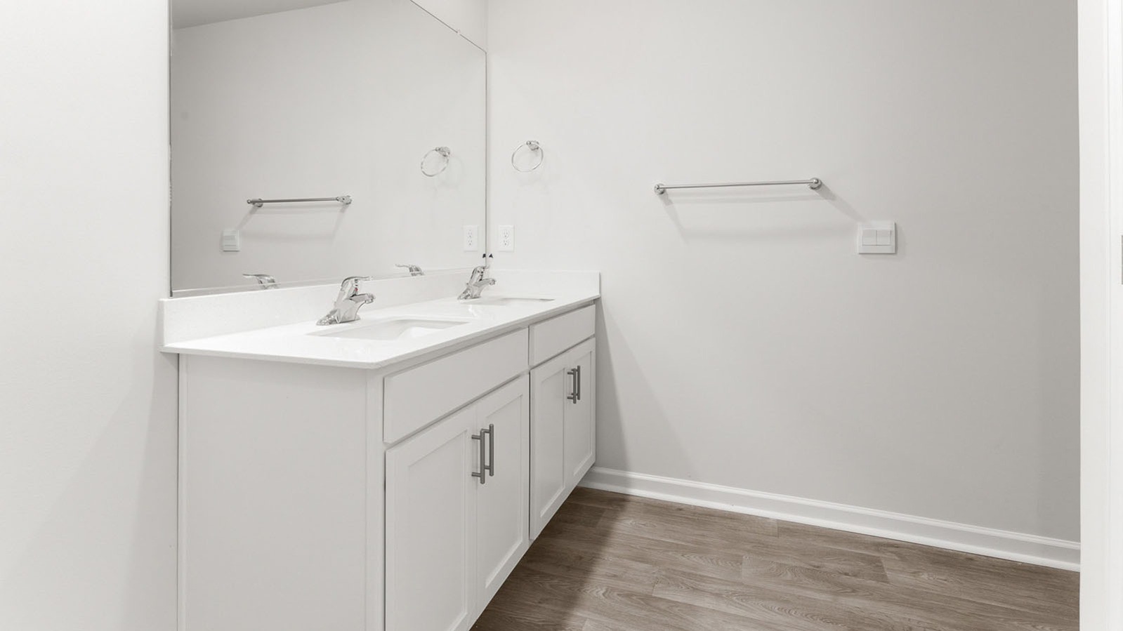 primary bathroom with dual sinkbowl