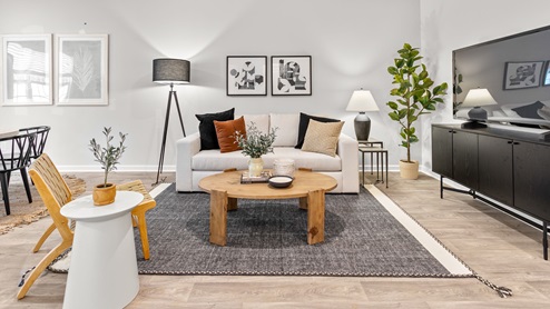 living room with vinyl floors and natural light