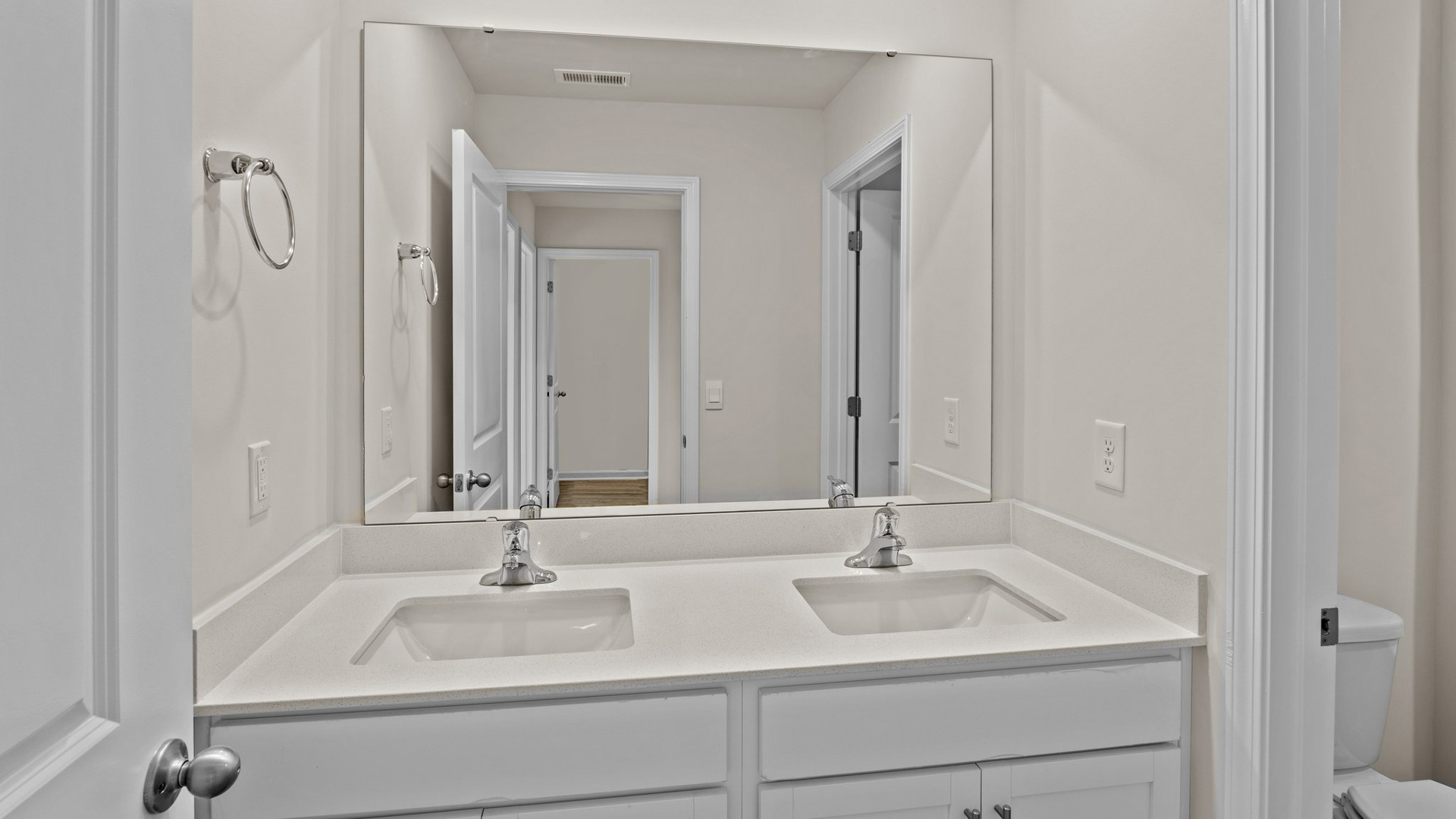 secondary bathroom with double sink