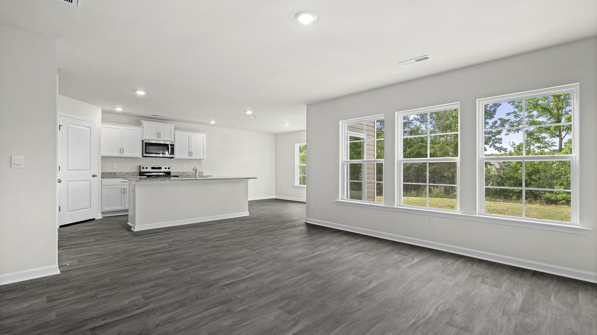living area and partial kitchen view