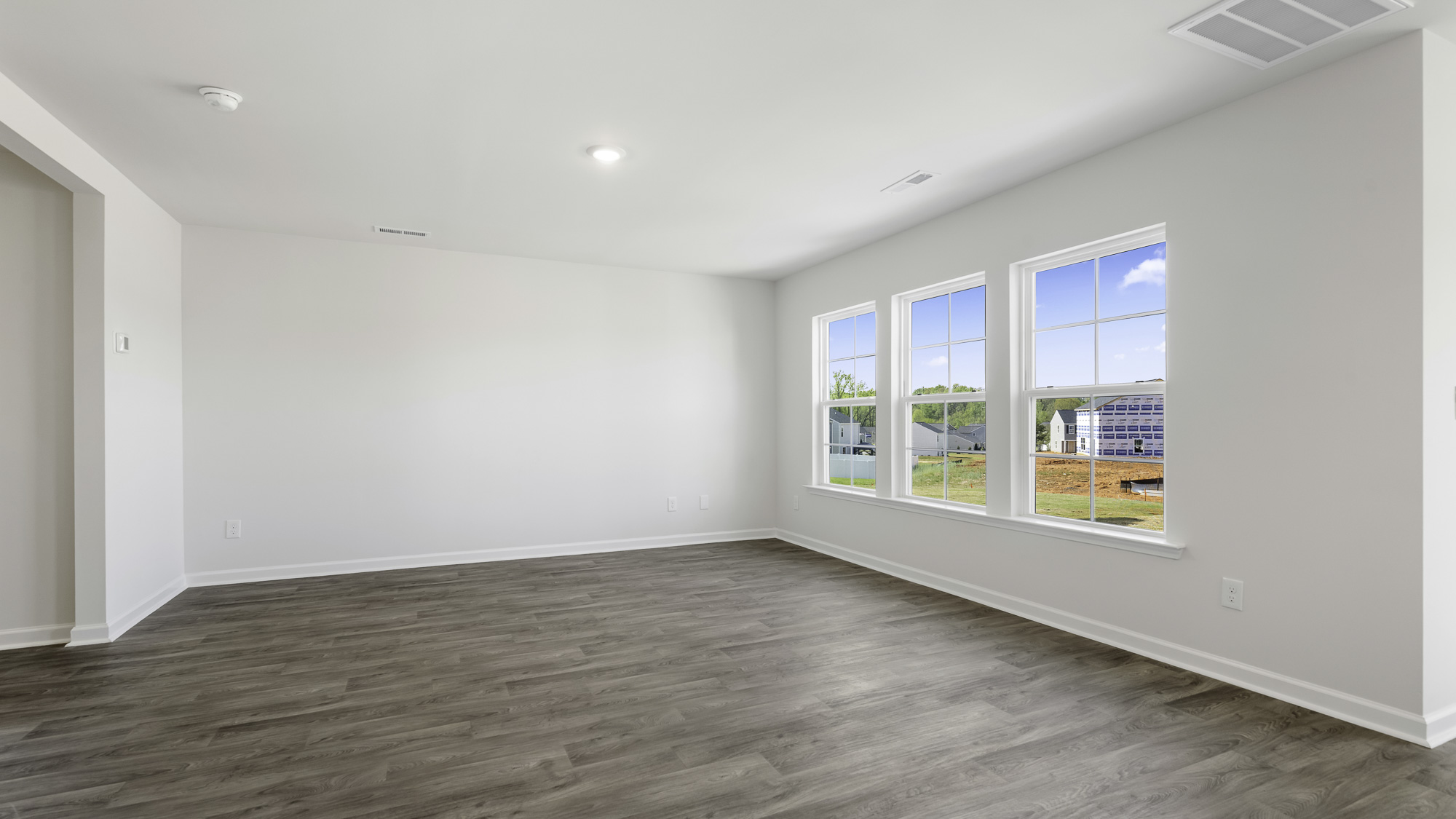 living room with vinyl flooring