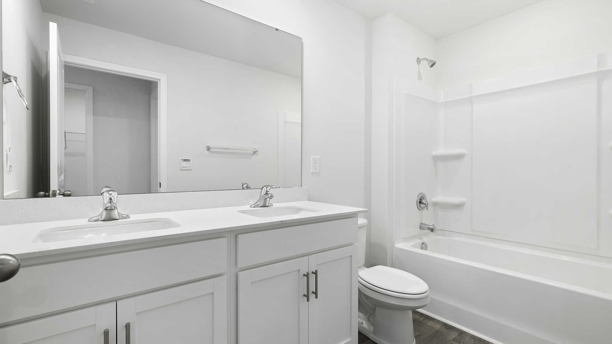 bathroom with dual sinks
