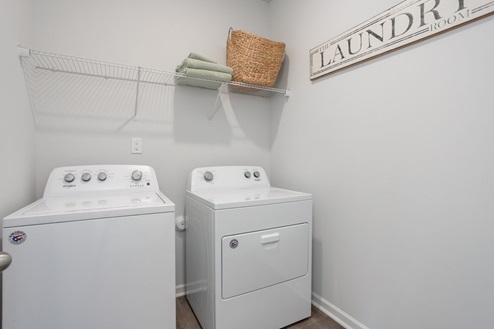 laundry room with shelfs