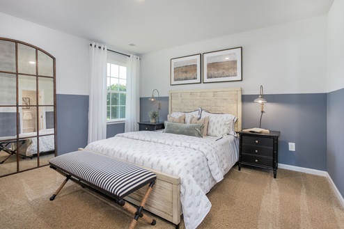 bedroom with carpet and natural light