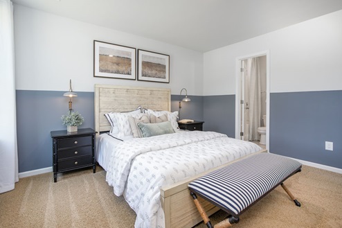 bedroom with carpet and natural light
