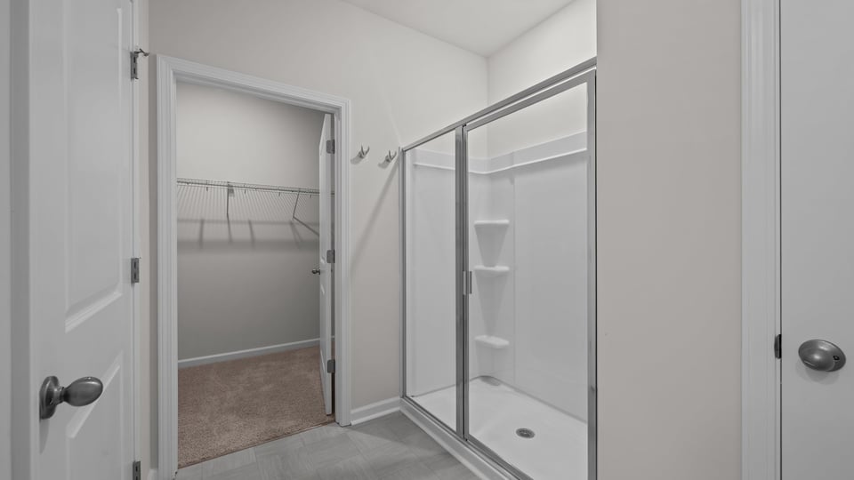 primary bathroom with walk in shower