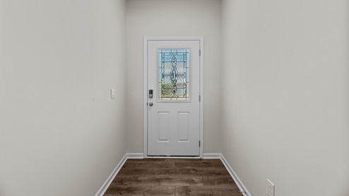 Foyer with revwood flooring