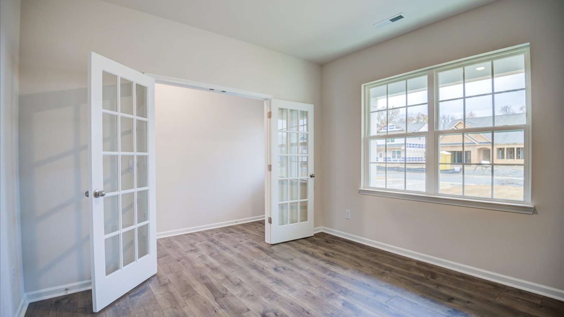 office with revwood floors and french doors