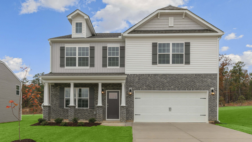 2 story home with brick