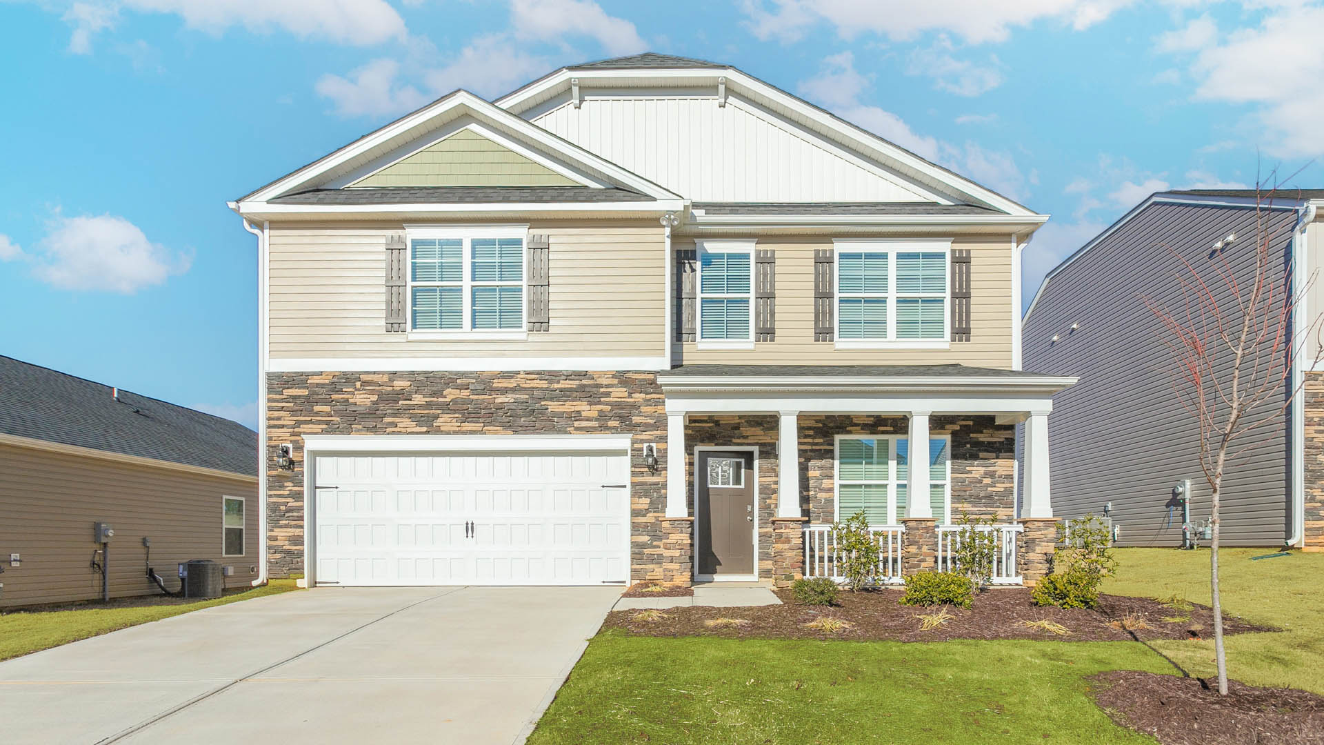 THE WILMINGTON 2 STORY 2 CAR GARAGE 4 BED 2.5 BATH HOME