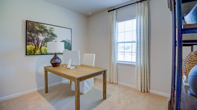 office with carpet and natural light