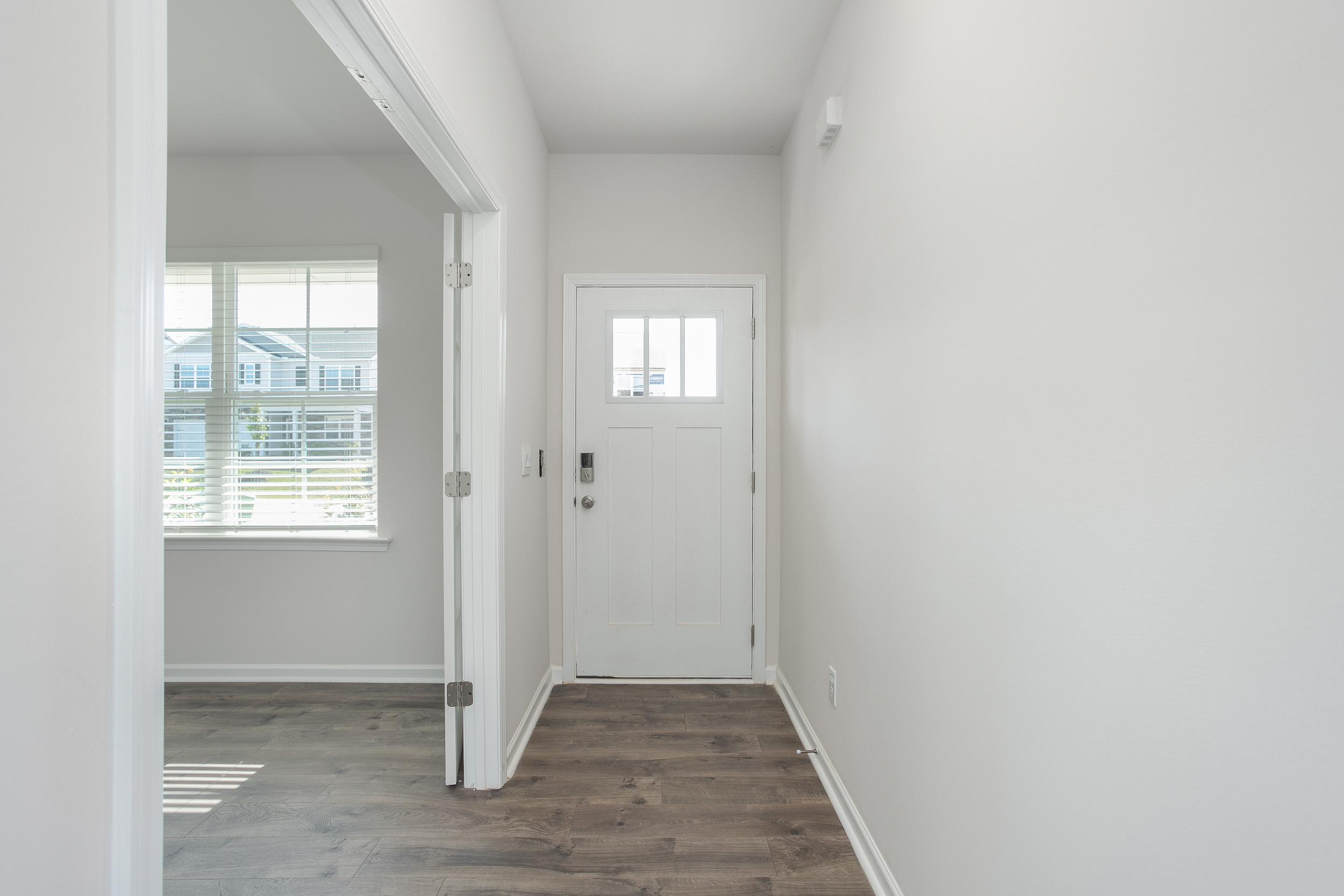 Front door with revwood floors