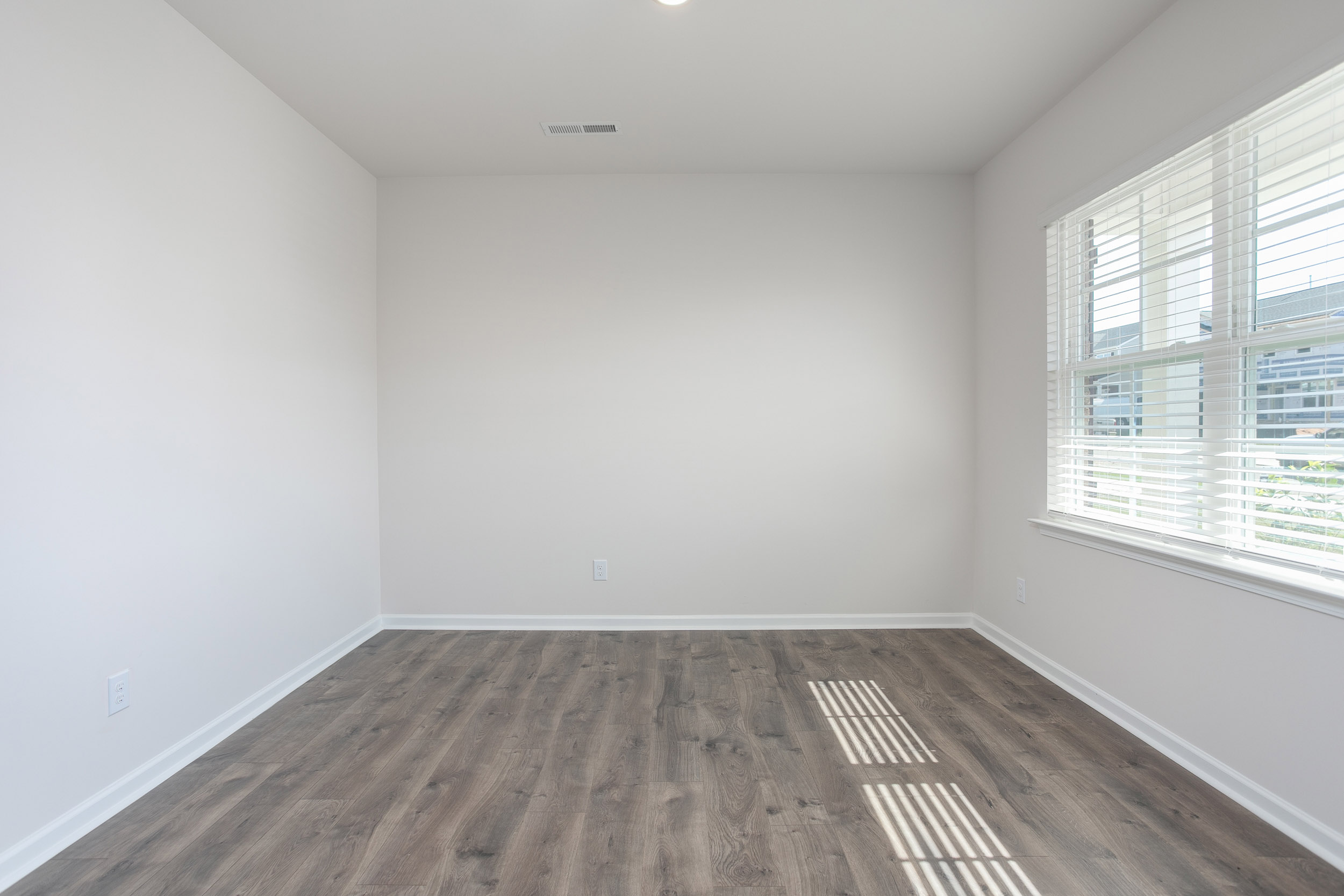 foyer with revwood floors and french doors
