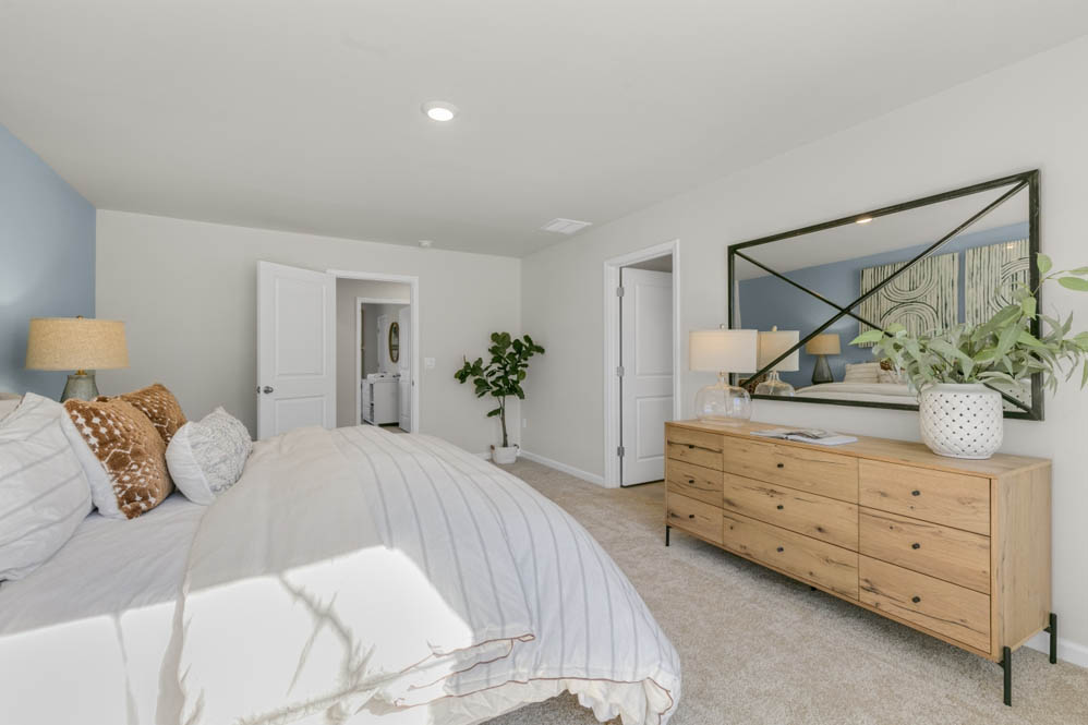 bedroom with caret and natural light