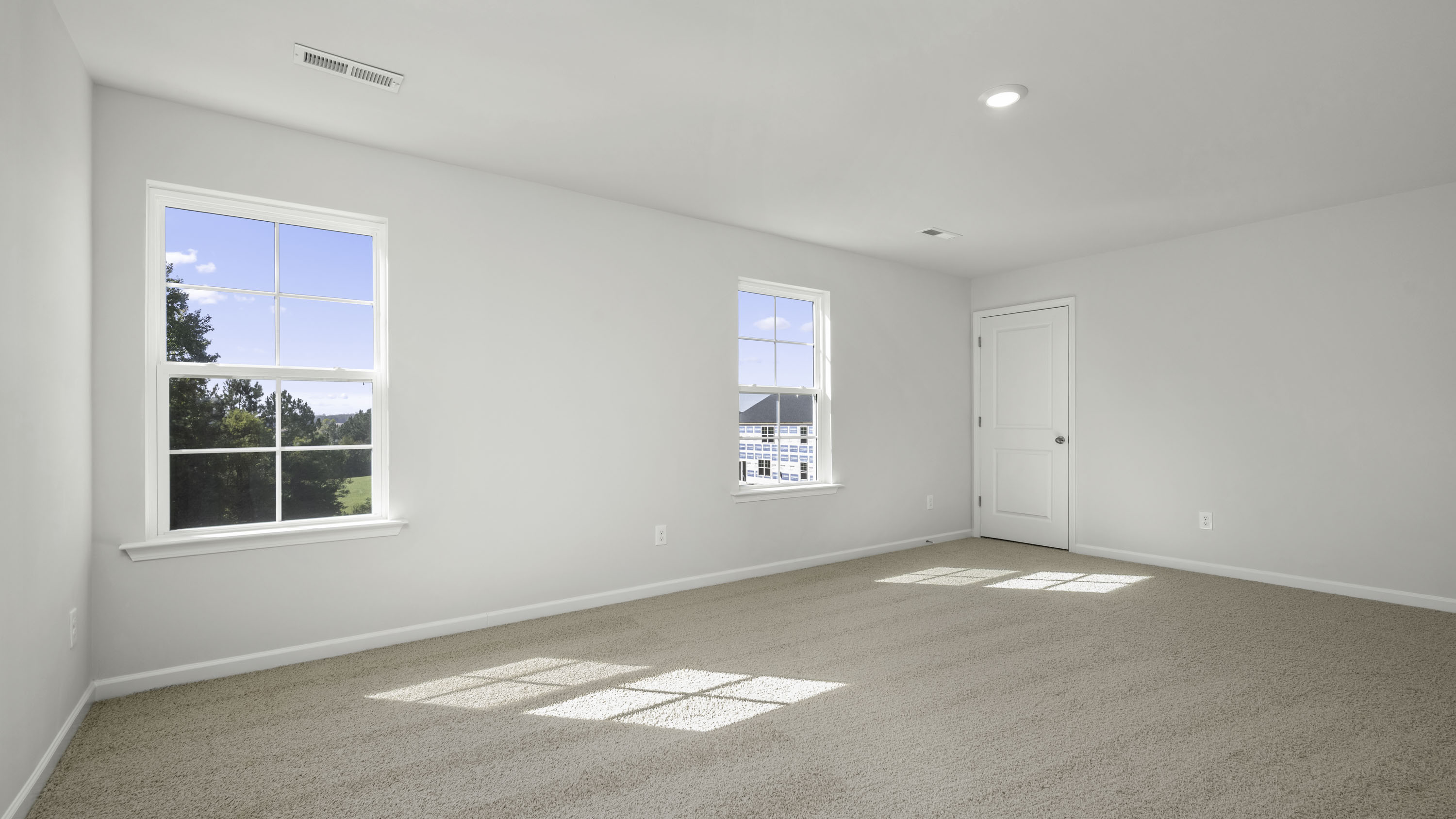 bedroom with windows