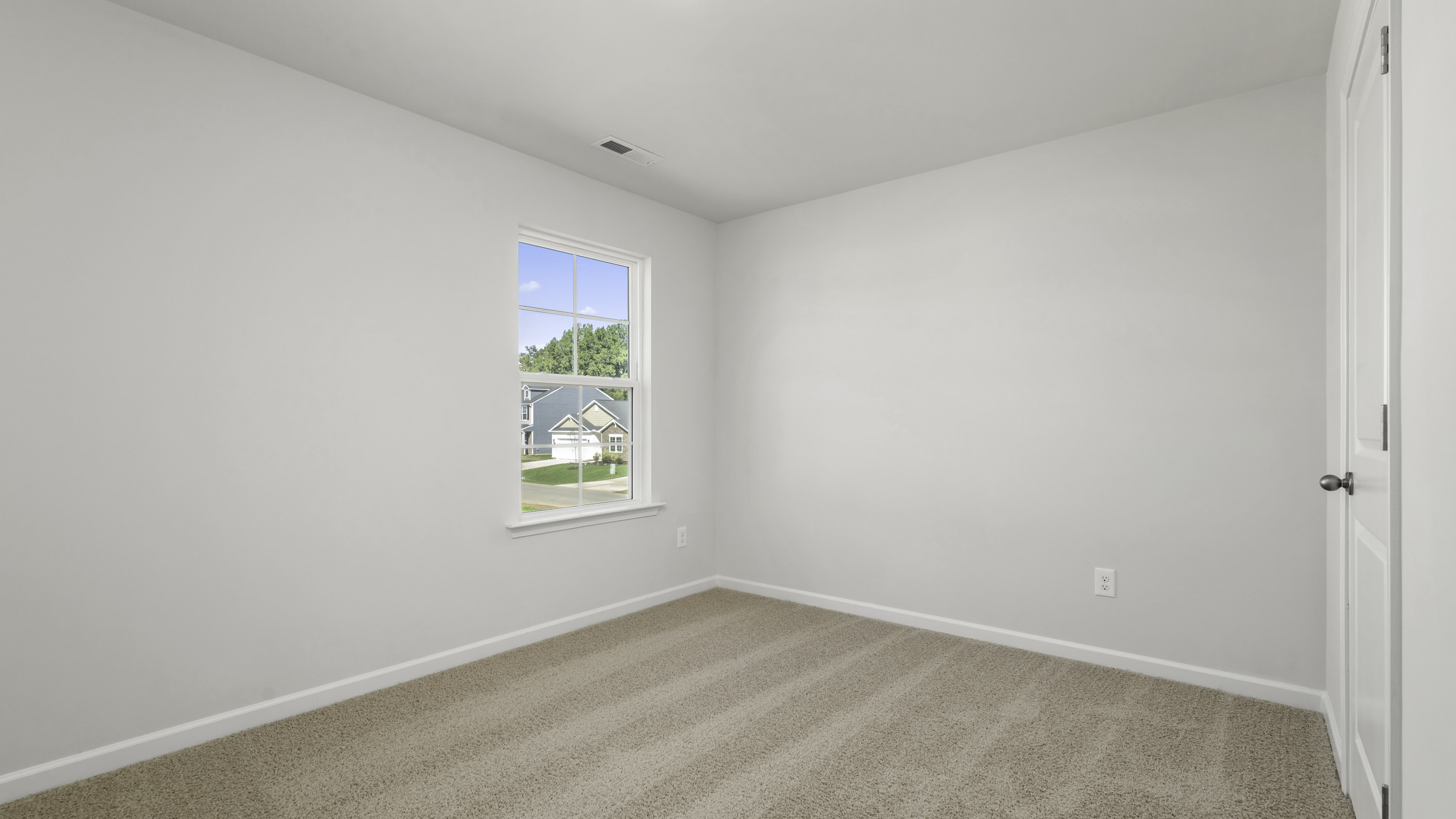 secondary with window and carpet