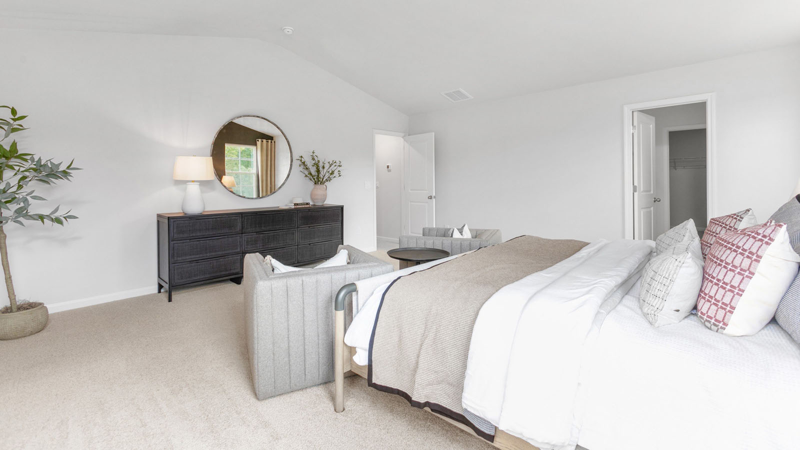 primary bedroom with carpet